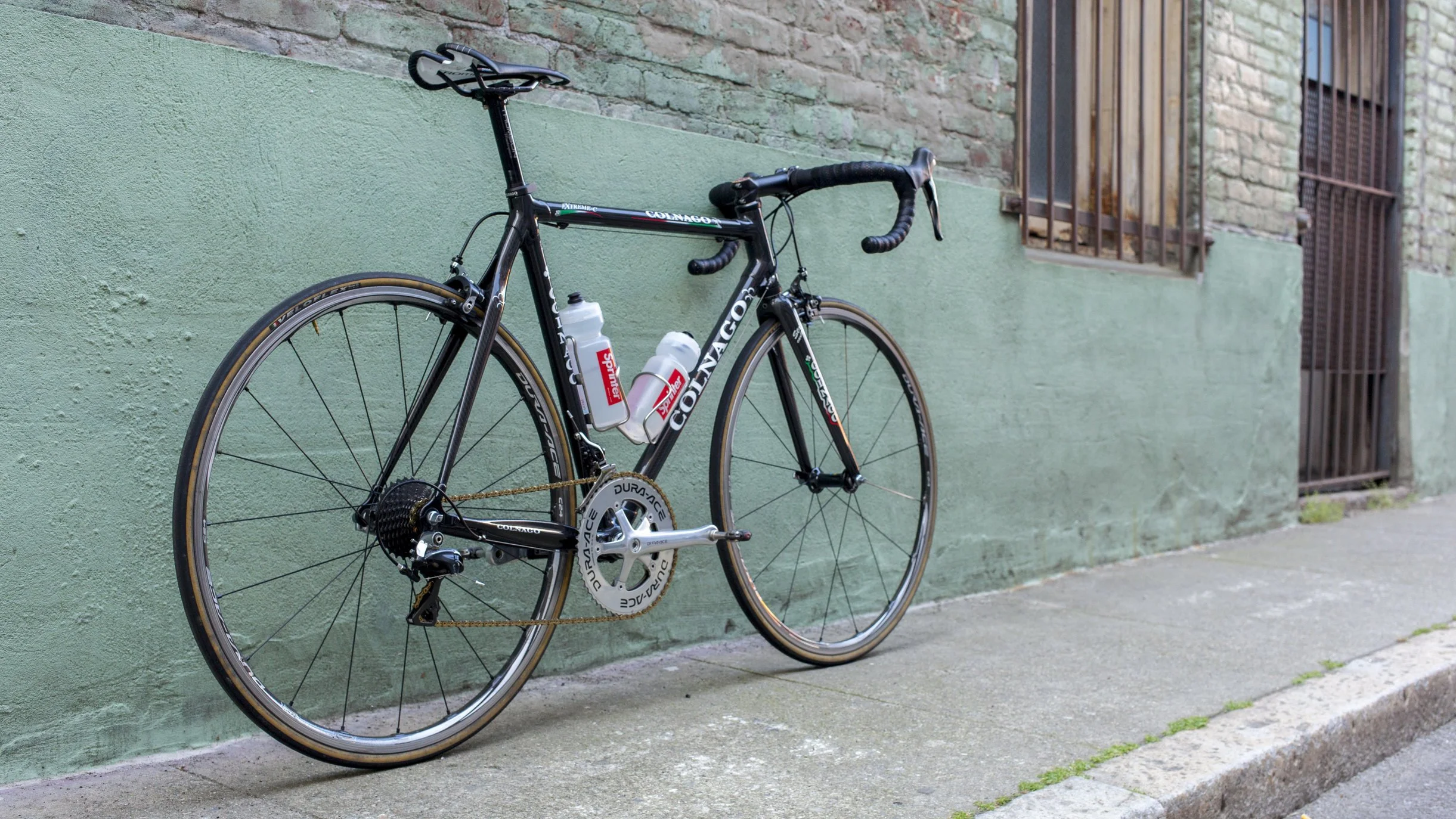 A 2009 Colnago Extreme-C road racing bike used for racing and commuting in downtown San Francisco.