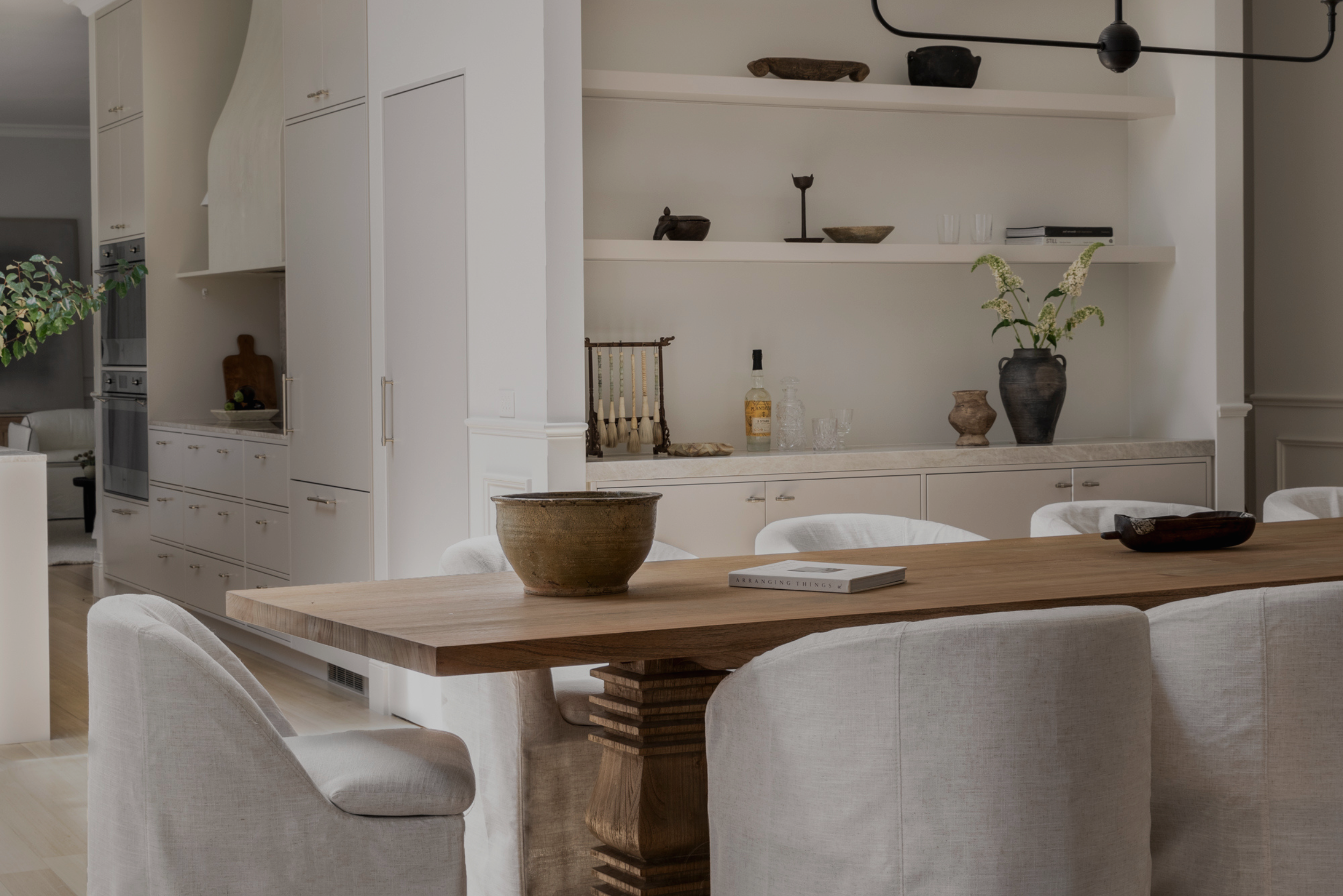 Country home dining table with shelf styling