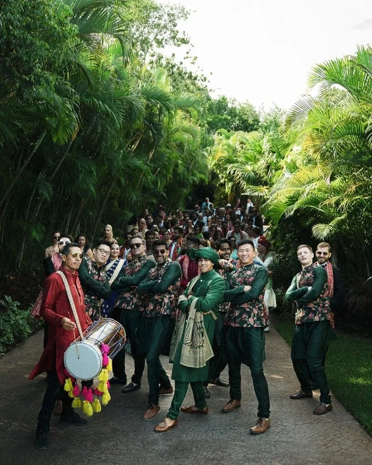 A tropical Baraat, surrounded by palms, music, and unforgettable energy.

Wedding Design Planning @sjsevents
Photographer @andreassellinidis 
Venue @rwmayakoba 
Floral and Production @sterling.experiences 
Bridal stylist @styledbypuja
Wedding gown @b