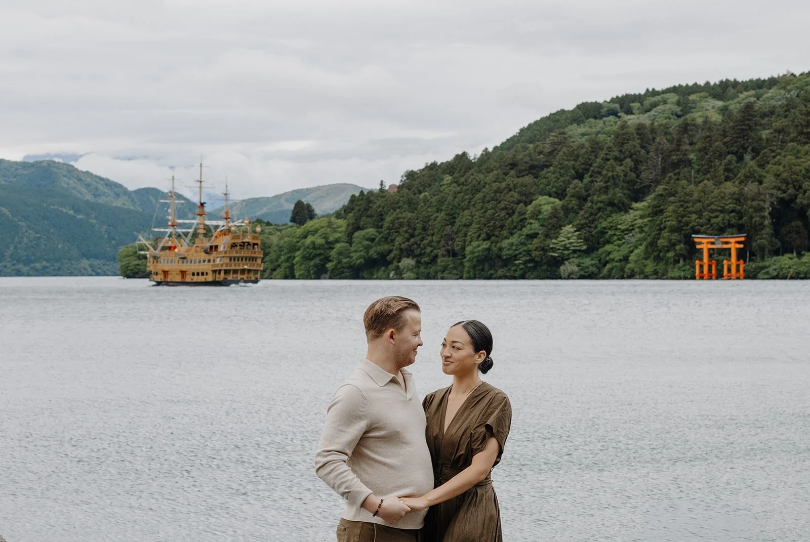 embracing-in-front-of-sea-and-ship.jpg