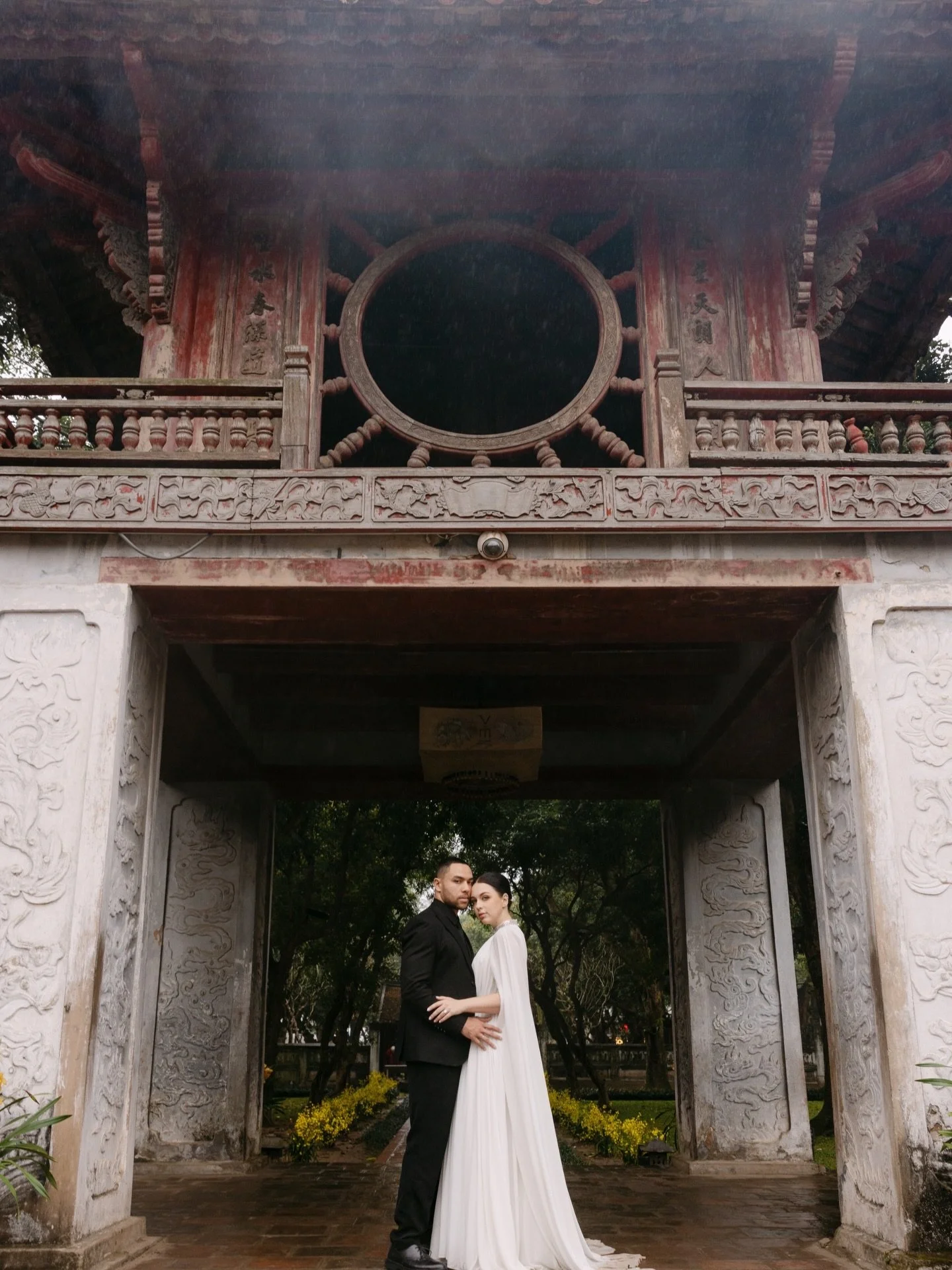 A prewedding photoshoot in Hanoi feels like stepping into something timeless, without trying too hard.

The Temple of Literature sits quietly in the middle of the city, layered with history and intention. Built in 1070 as Vietnam&rsquo;s first univer