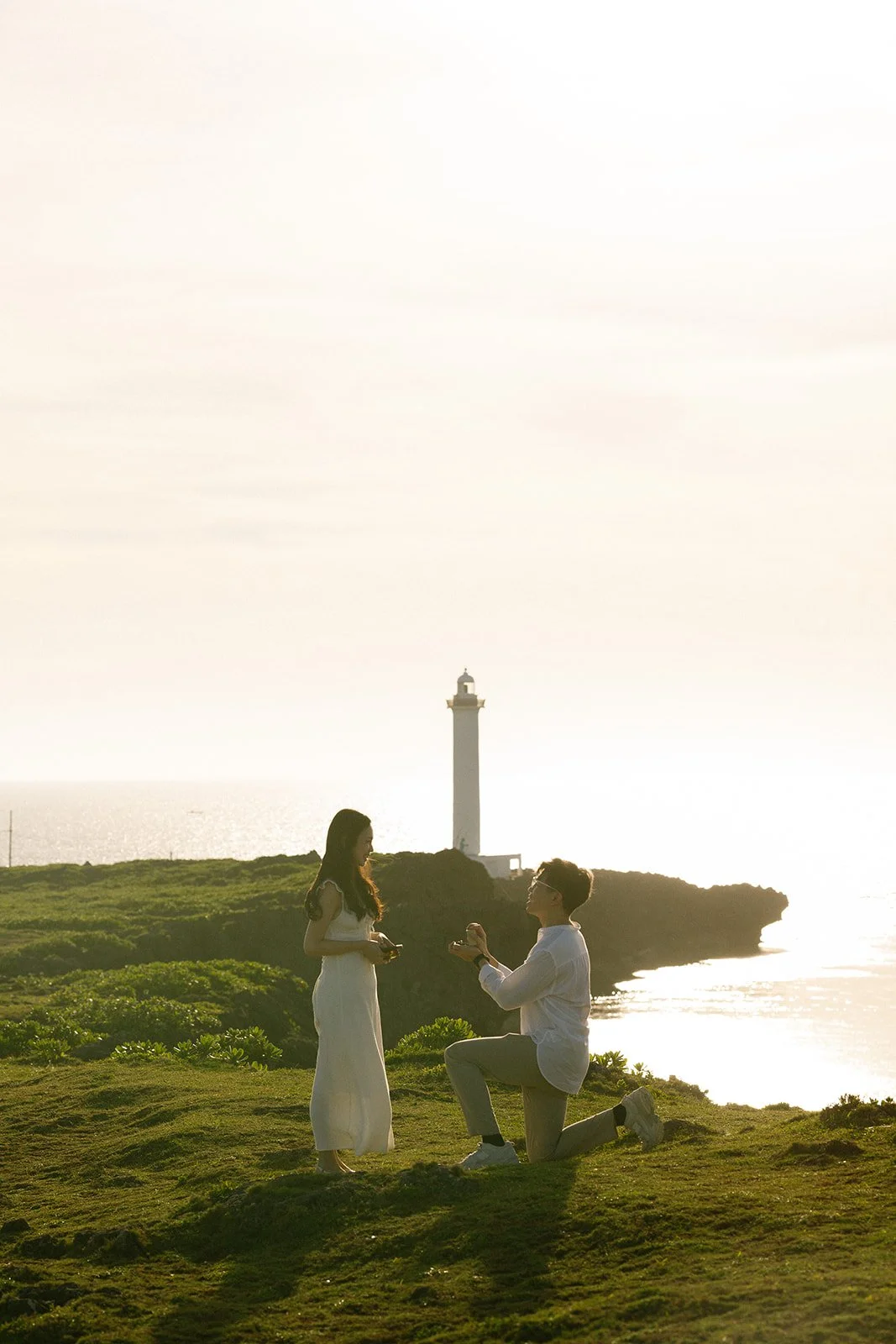 cape-zanpa-proposal-lighthouse-kneeling-11.jpg