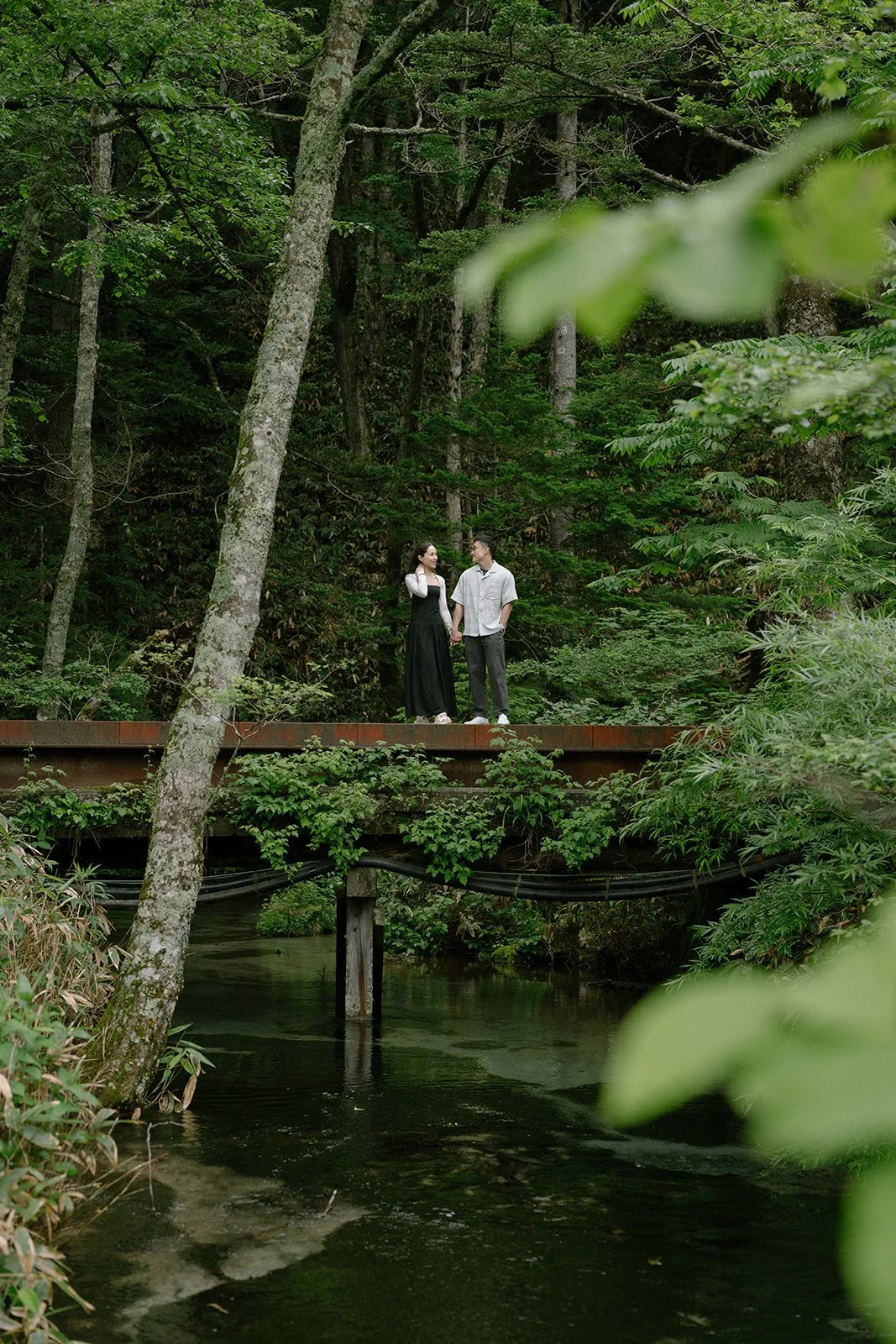 brian-shireen-kamikochi-forest-bridge-pond-standing-10.jpg