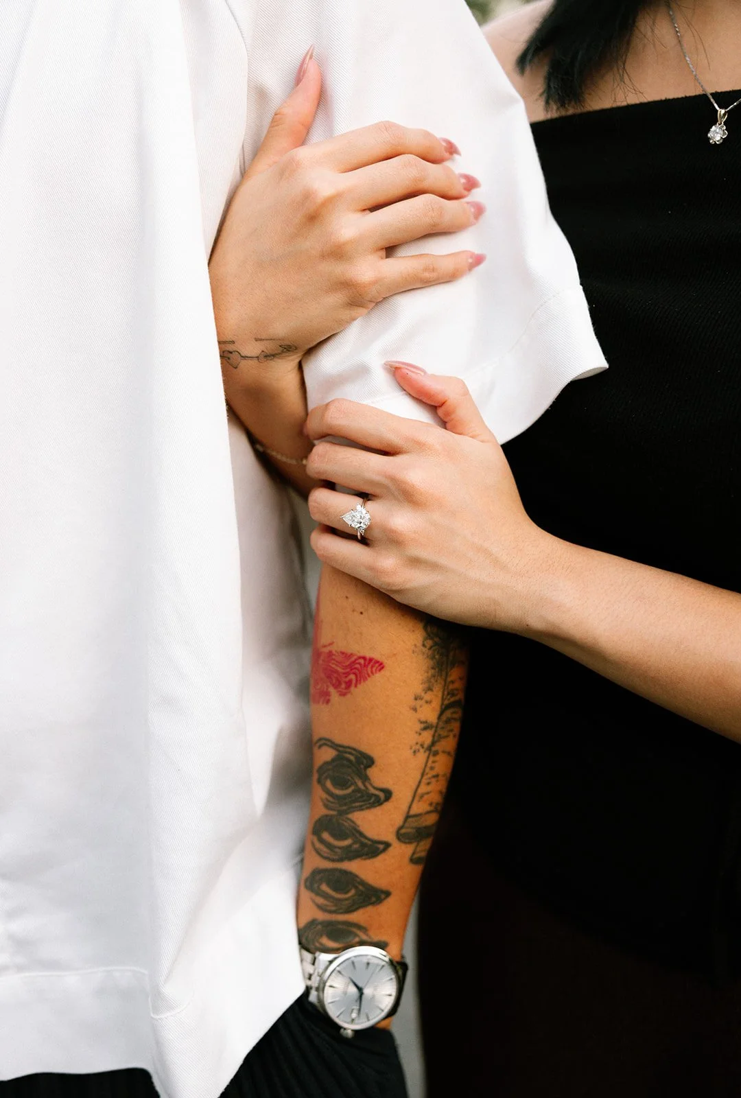 chris-harlyn-kyoto-proposal-couple-arm-detail-necklace-alt-11.jpg
