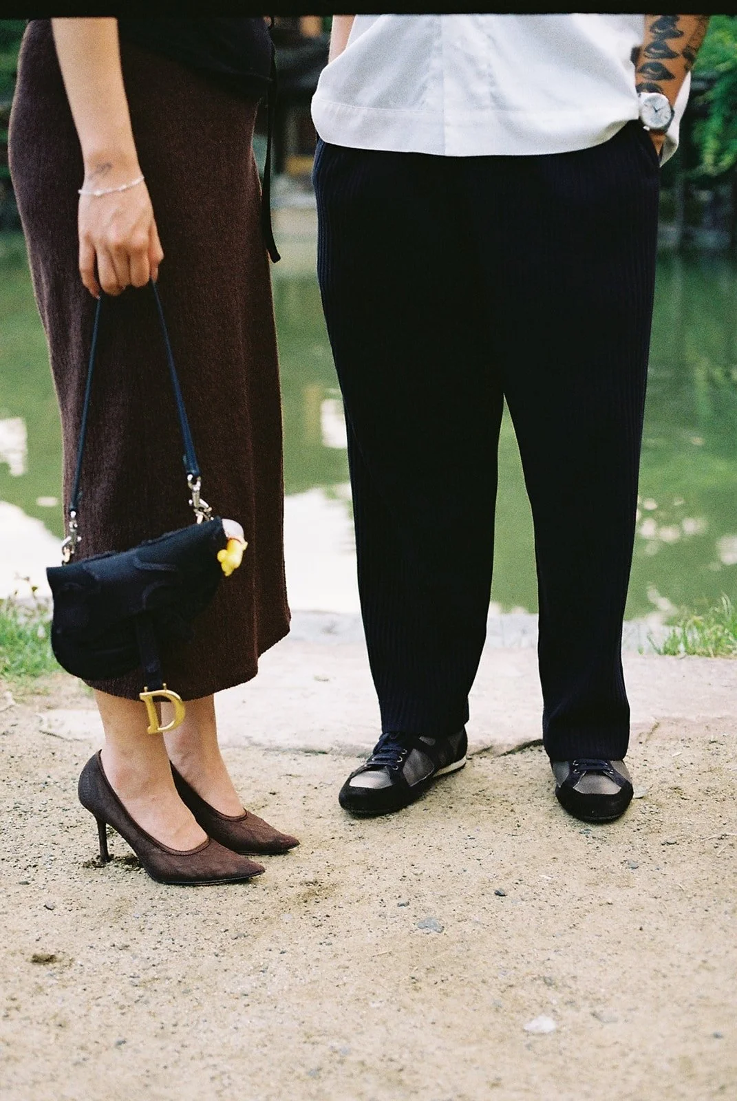 chris-harlyn-kyoto-proposal-couple-details-shoes-pond-01.jpg