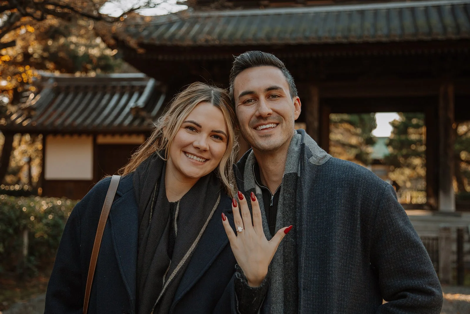 Danyelle showing her engagement ring in engagement photography Kyoto