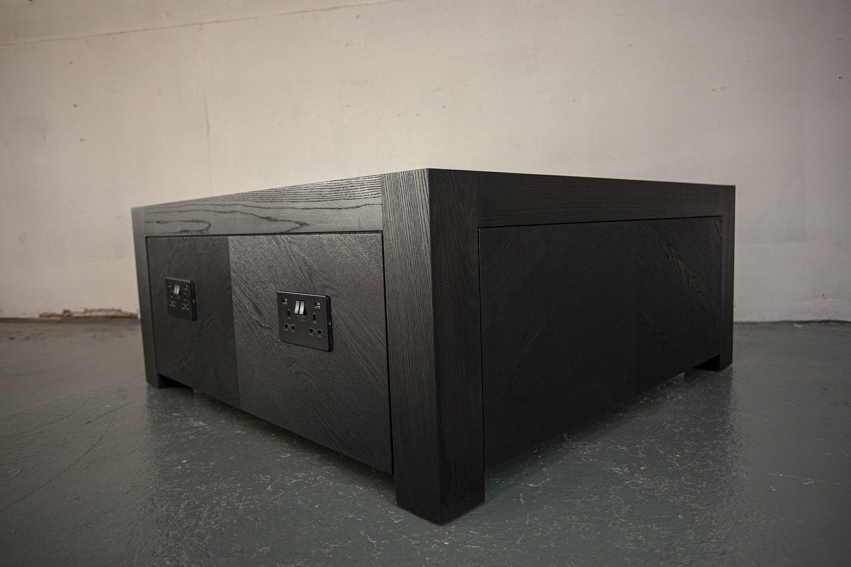 bespoke modern coffee table made from blackened ash timber for a luxury interior