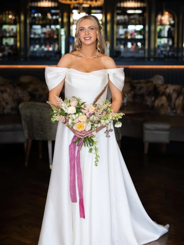 Say hello to modern romance 🤍

Introducing the stunning Orchid dress, worn by our real bride Louise and designed by the amazing Al Bridal Couture aka Audra 🤍&mdash; a designer celebrated for effortlessly blending timeless elegance with contemporary