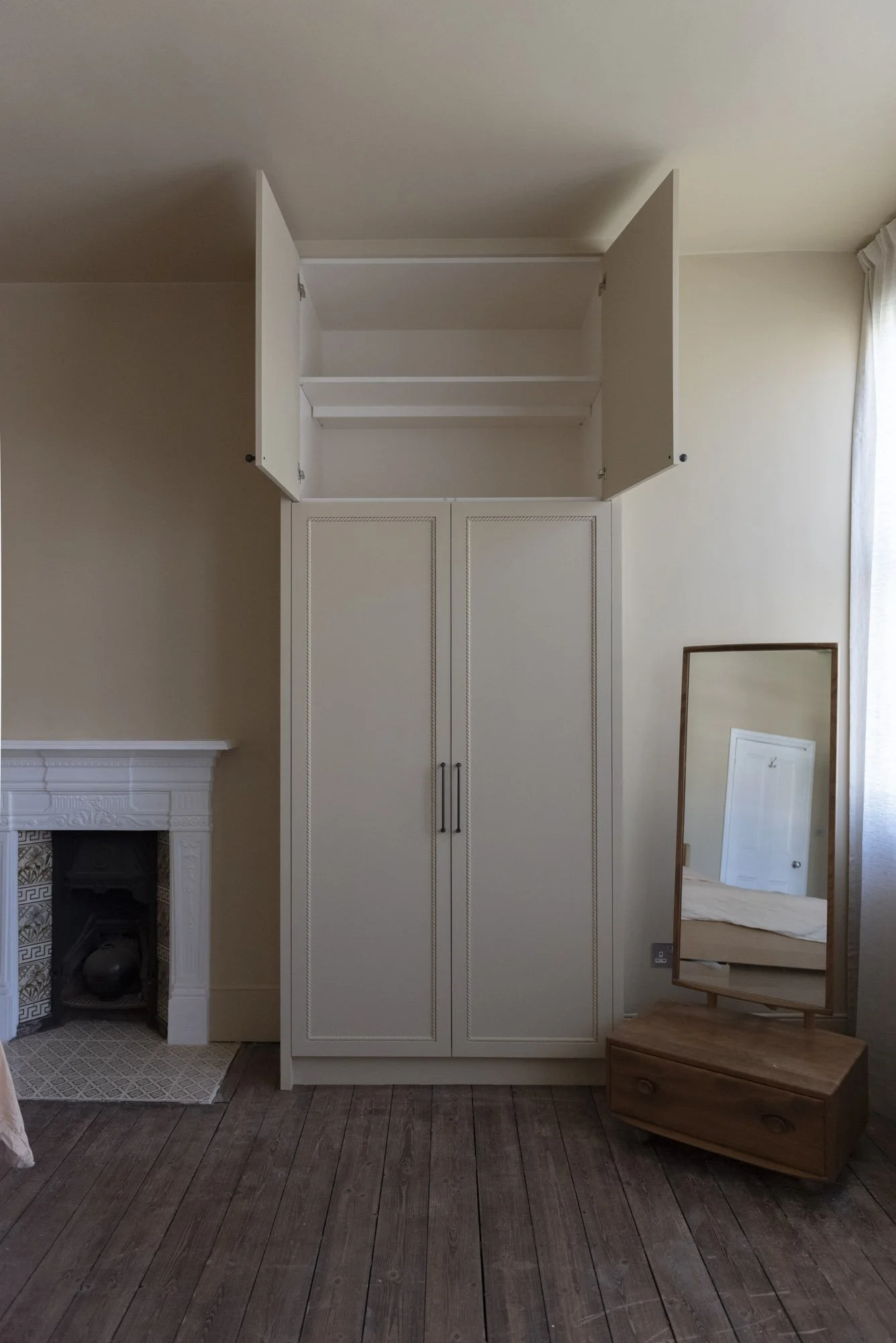 Interior shelving layout of custom fitted wardrobes in Camè Beige