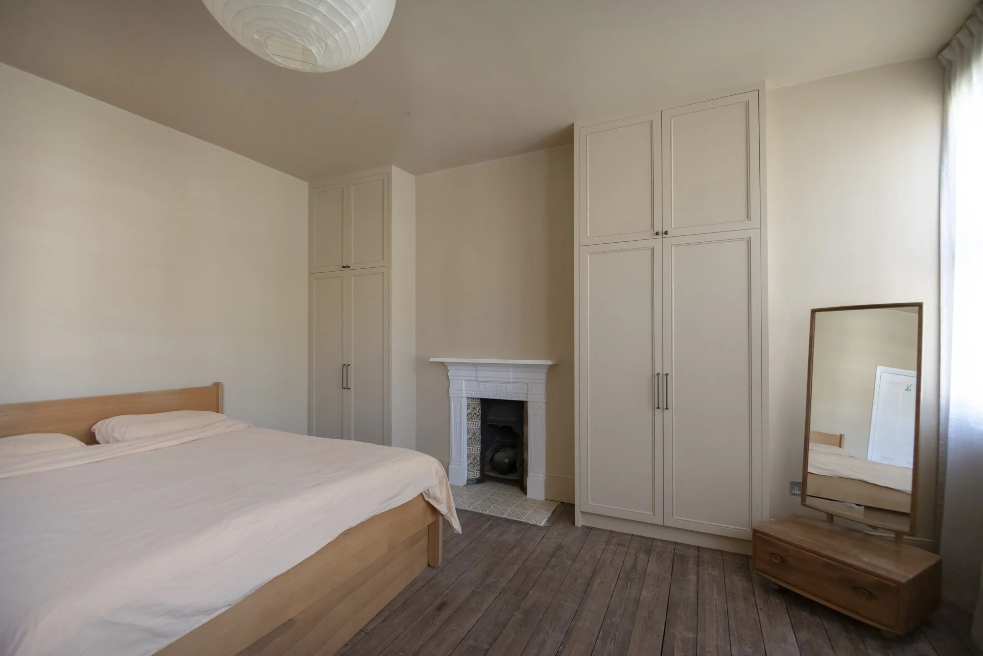 Interior shelving layout of custom fitted wardrobes in Camè Beige