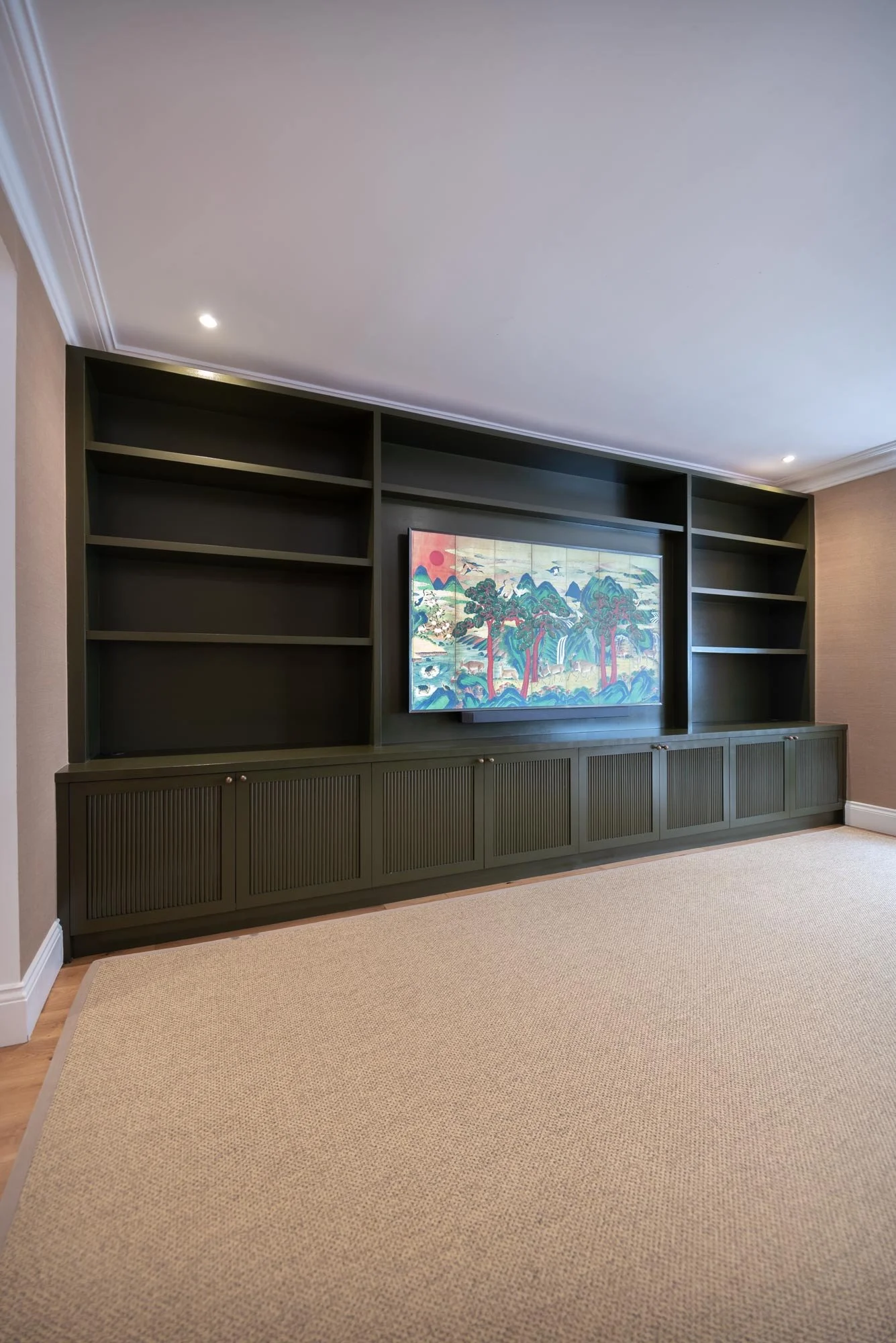 Custom built media wall storage in W14 London, full height shaker cabinetry and integrated TV unit