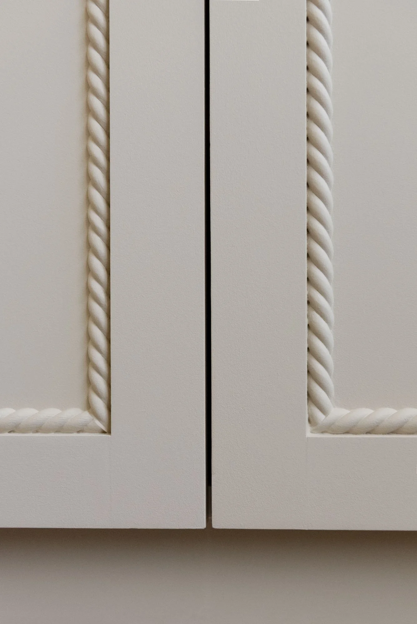 Close-up of built-in wardrobe joinery and scribed edges