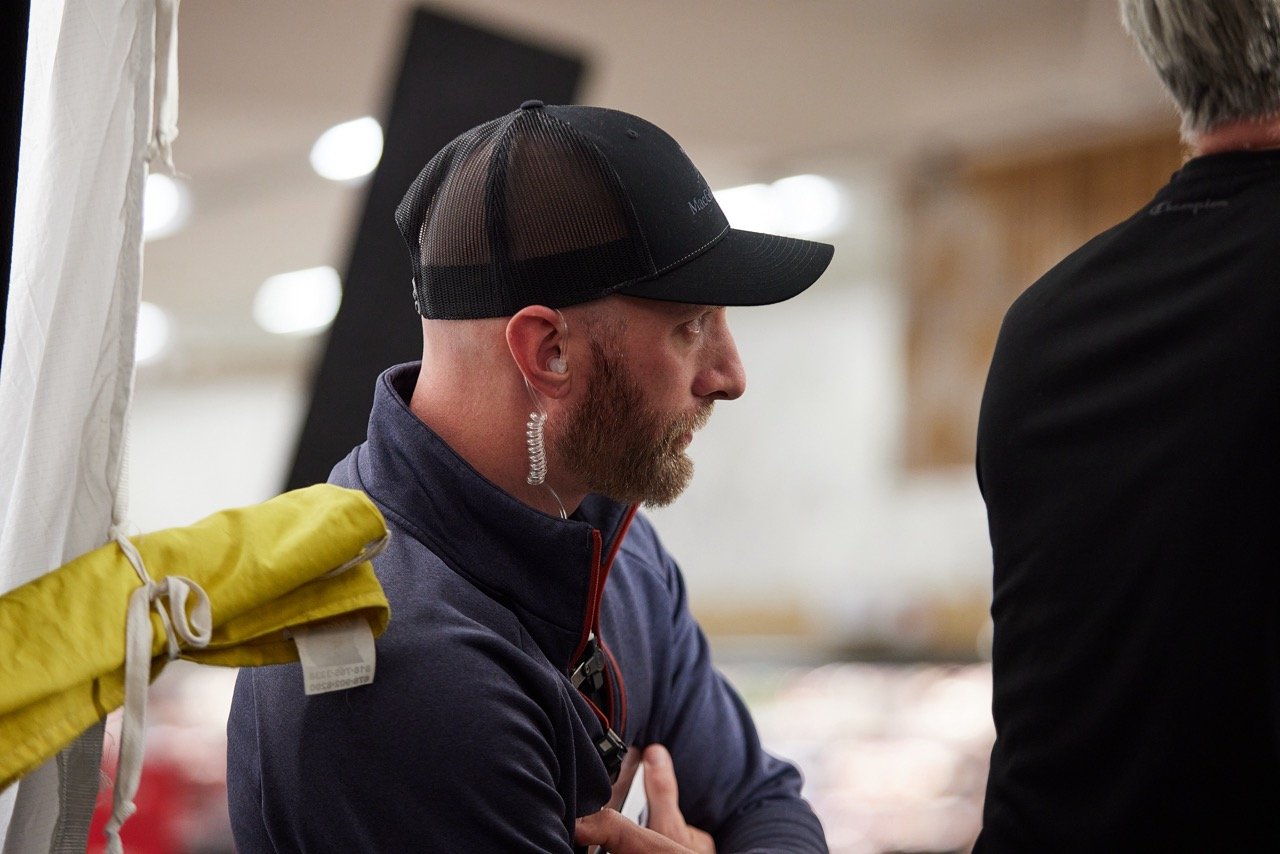 Director watching the crew ahead of crew move to new location.