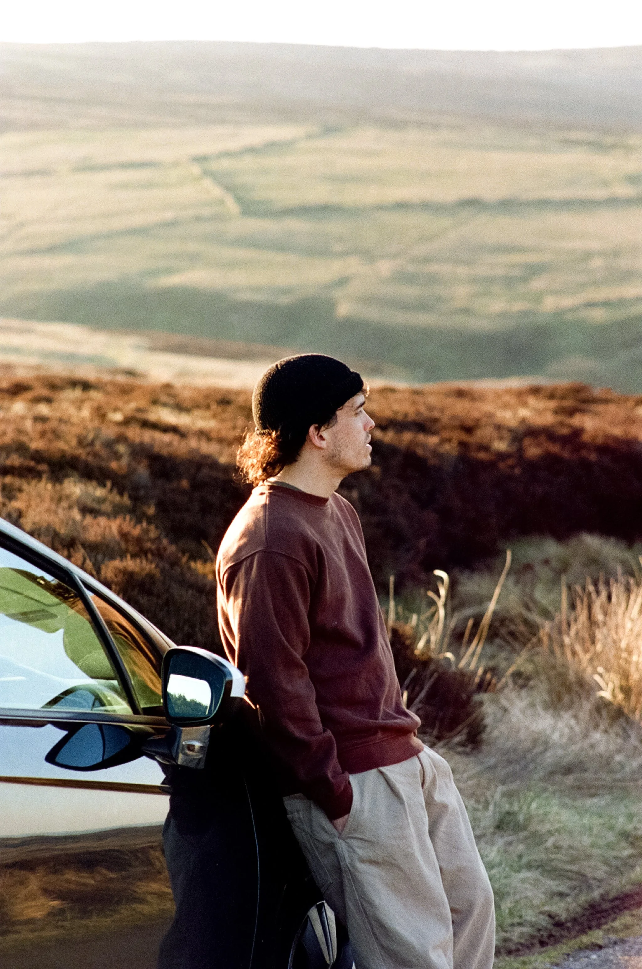 I was shooting a music video for my friend Ben Haydn up in the Peak District when I spotted him leaning on the car staring off at the view. I think we both long to be out in nature.