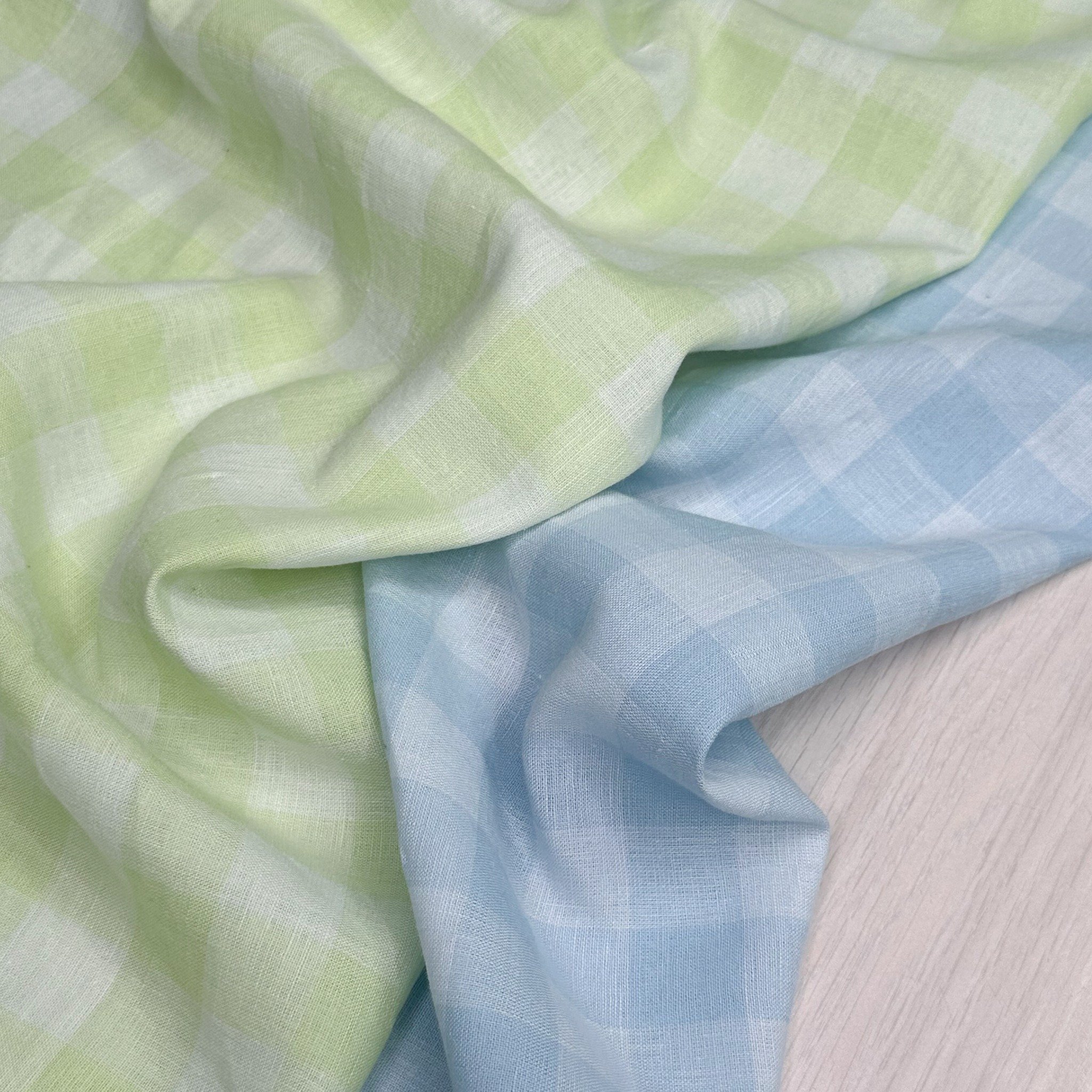 A fresh twist on a favourite 💚 Introducing Utopia Check 2855 in Sky and Lime.

Utopia is a breathable linen and cotton blend, made with a soft, washed finish. This new design is perfect for a breezy summer top or dress.

#gordonfabricsltd #ss26 #lin
