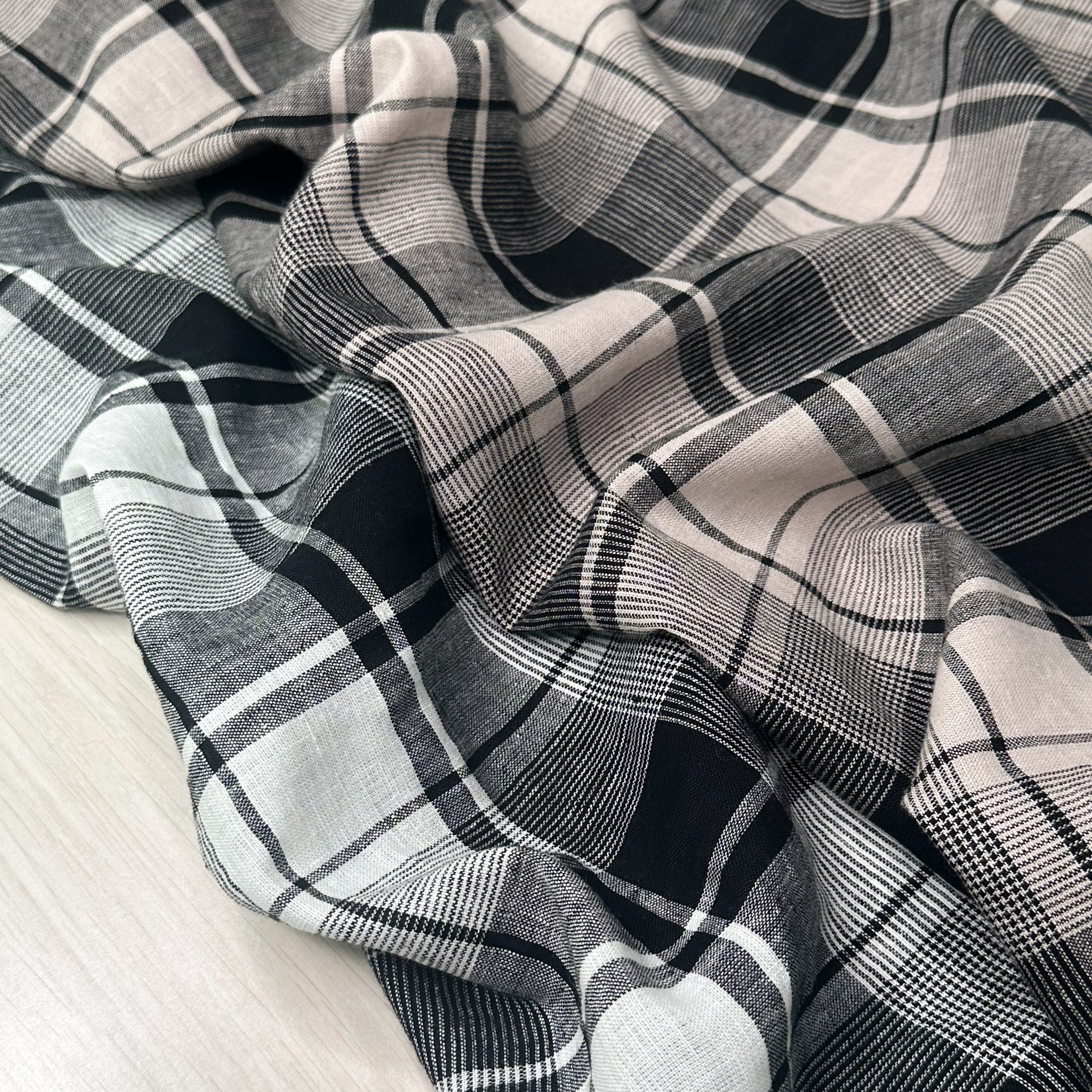 Utopia 2858 is our latest yarn-dyed check, woven from a premium blend of linen and cotton.

This sophisticated new check design is offered in two timeless colourways&mdash;Natural/Black and White/Black. Now available and ready for immediate shipping!