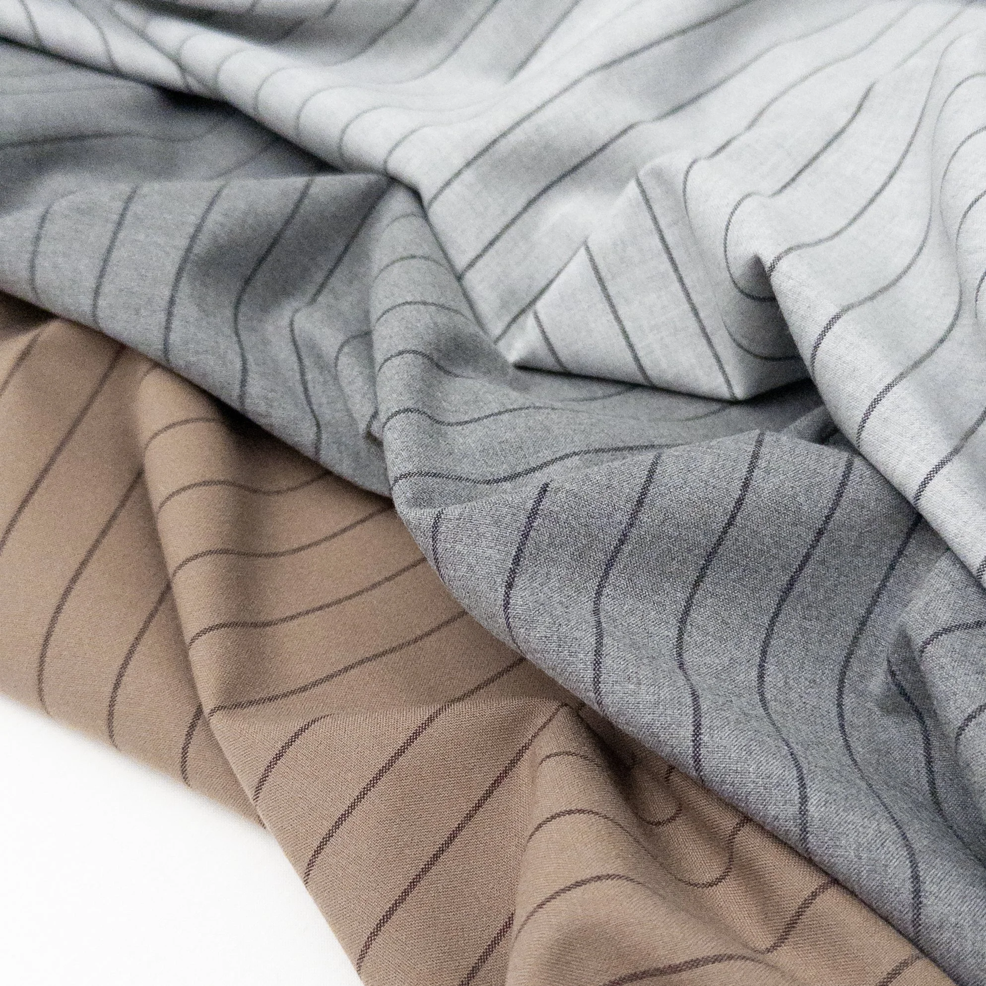 Introducing Norah, our brand new yarn-dyed suiting! This fabric has a hint of spandex for added stretch, and features a gorgeous cashmere-touch soft hand feel. Perfect for sophisticated-looking tailored pieces, that also keep you comfortable.

In sto