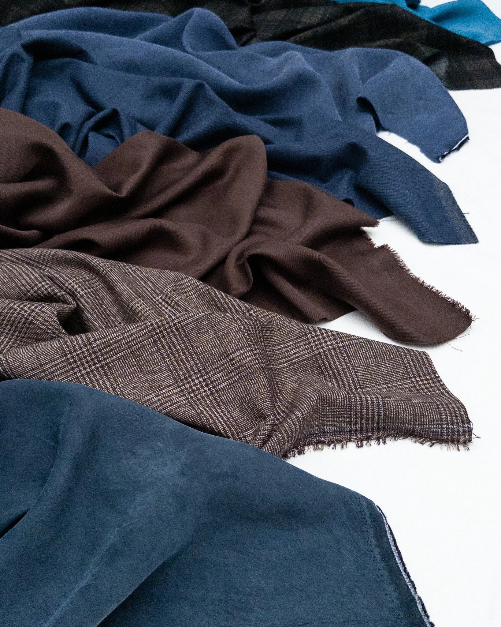 From moody jewel tones to warm espresso, this fall palette comes alive in drapey TENCEL&trade; lyocell blends and softly structured suiting.

TENCEL&trade; is a trademark of Lenzing AG.

#gordonfabricsltd #fw26 #fallfabric #fallinspo