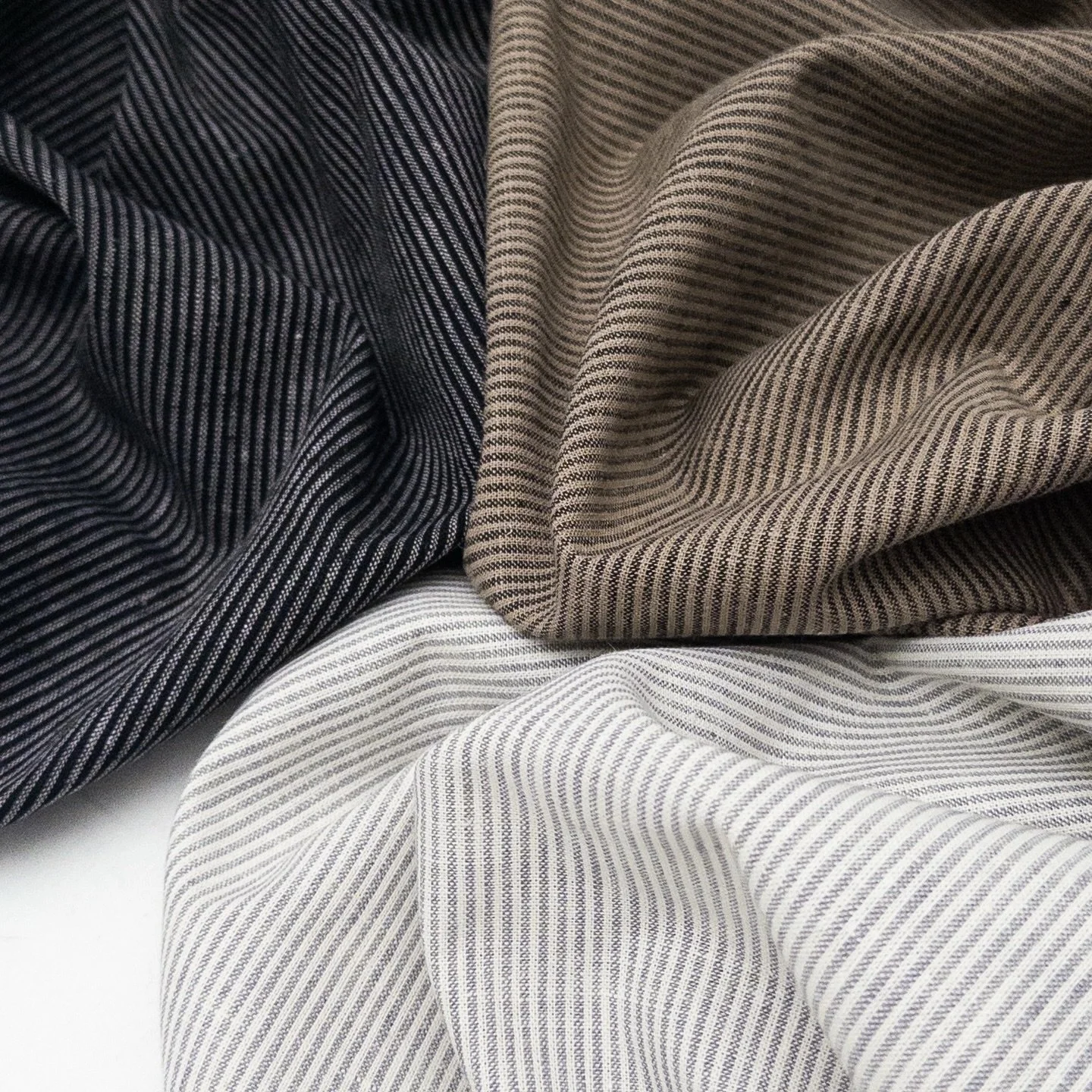 Our popular Sonoma stripe returns in three new versatile neutrals. This linen/cotton blend has a washed finish, which keeps that beautifully lived-in feel, with just the right amount of structure. Ideal for pants, or dresses and shirts that require a