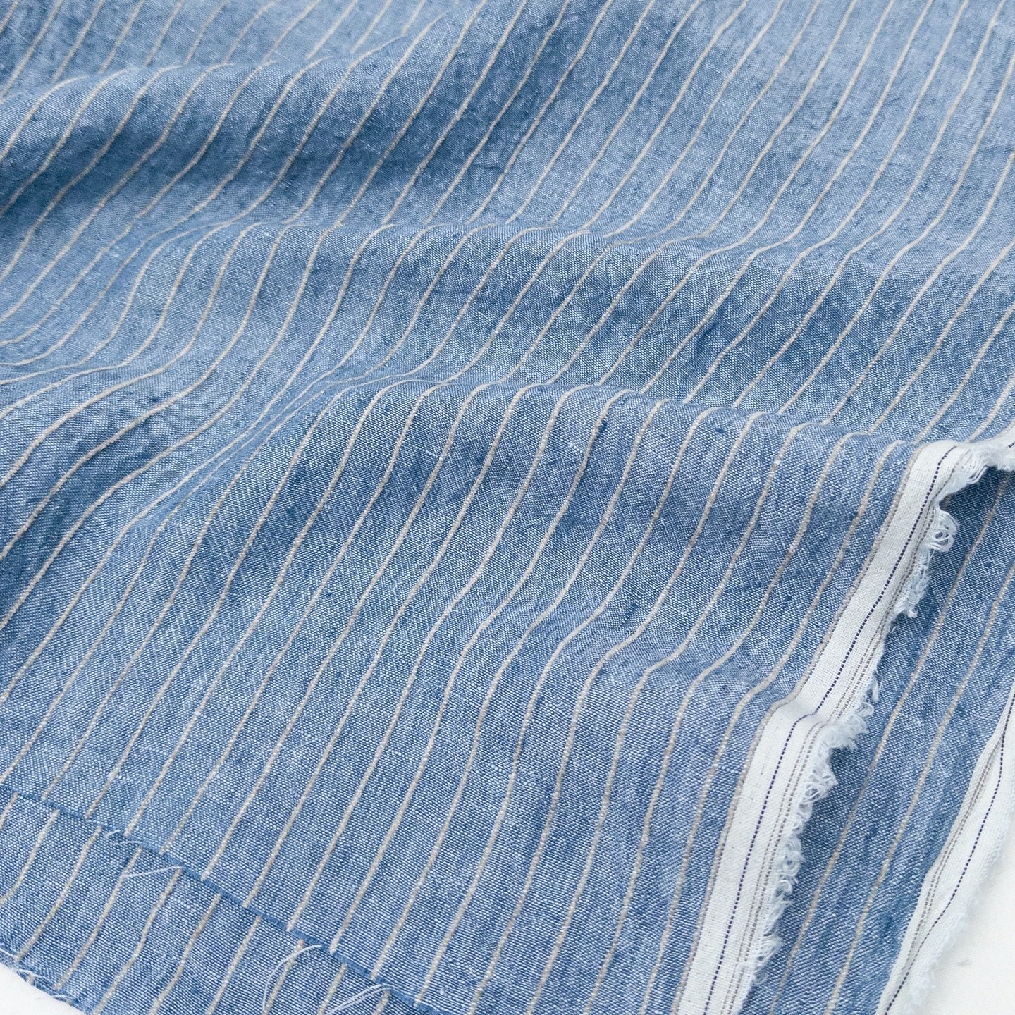 Our popular Bella Stripe is coming soon in a new, slightly wider scale (and some exciting new colours!) 💙

Bella is made with a linen/rayon blend and features a twisted stripe for added texture. This version is 165 GSM, making it a versatile fabric 