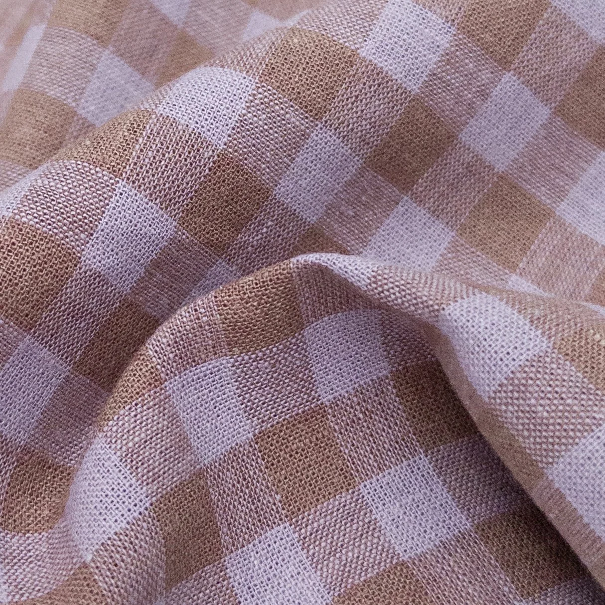 Two of our best-selling summer shades combined into one must-have gingham. Introducing Eden Check 2913 Lilac/Cocoa. 💜🤎

Eden is a yarn-dyed quality, made with a blend of cotton and linen. It is soft, lightweight, and breathable. Perfect for a range