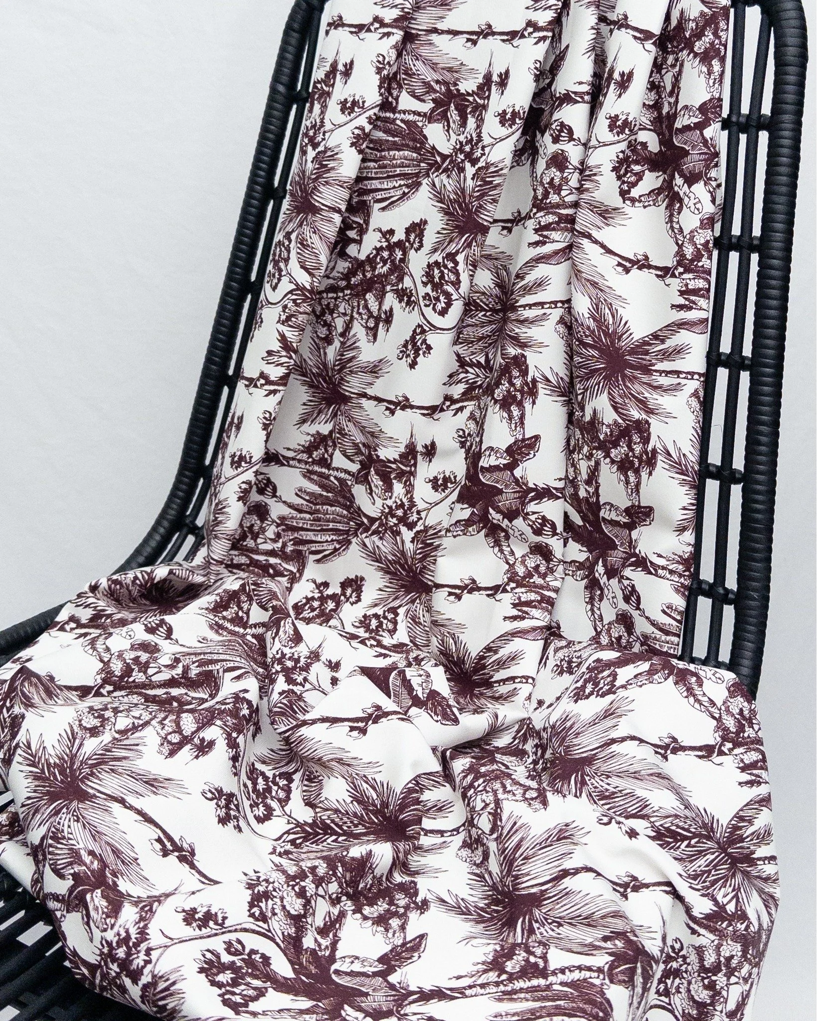 Say hello to the newest version of our printed heavyweight organic cotton: Scout 2948. A stunning toile-inspired palm print available in Pinot and Ink.

Similar to Porter, this fabric is slightly heavier weight in comparison to our other cottons, and