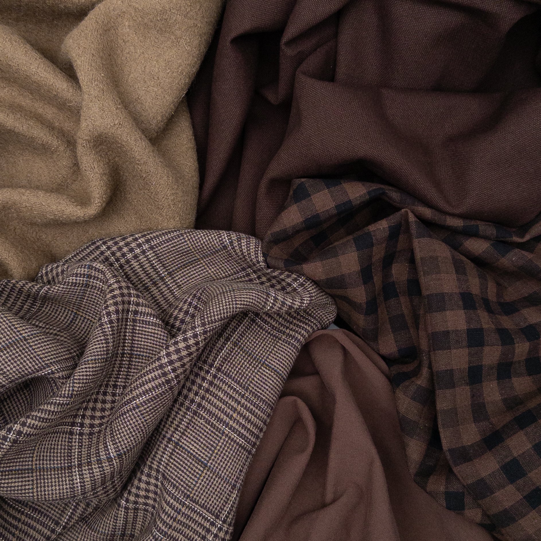 Rich Espresso browns are a must this Fall season ☕️ 

Featuring our brand new Eden yarn-dyed cotton/linen checks, and a few of our best-selling solids:
New! Eden 2965 Chocolate
Parker 100% boiled wool coating in Mocha
New! Eden 2971 Coffee Bean 
Port