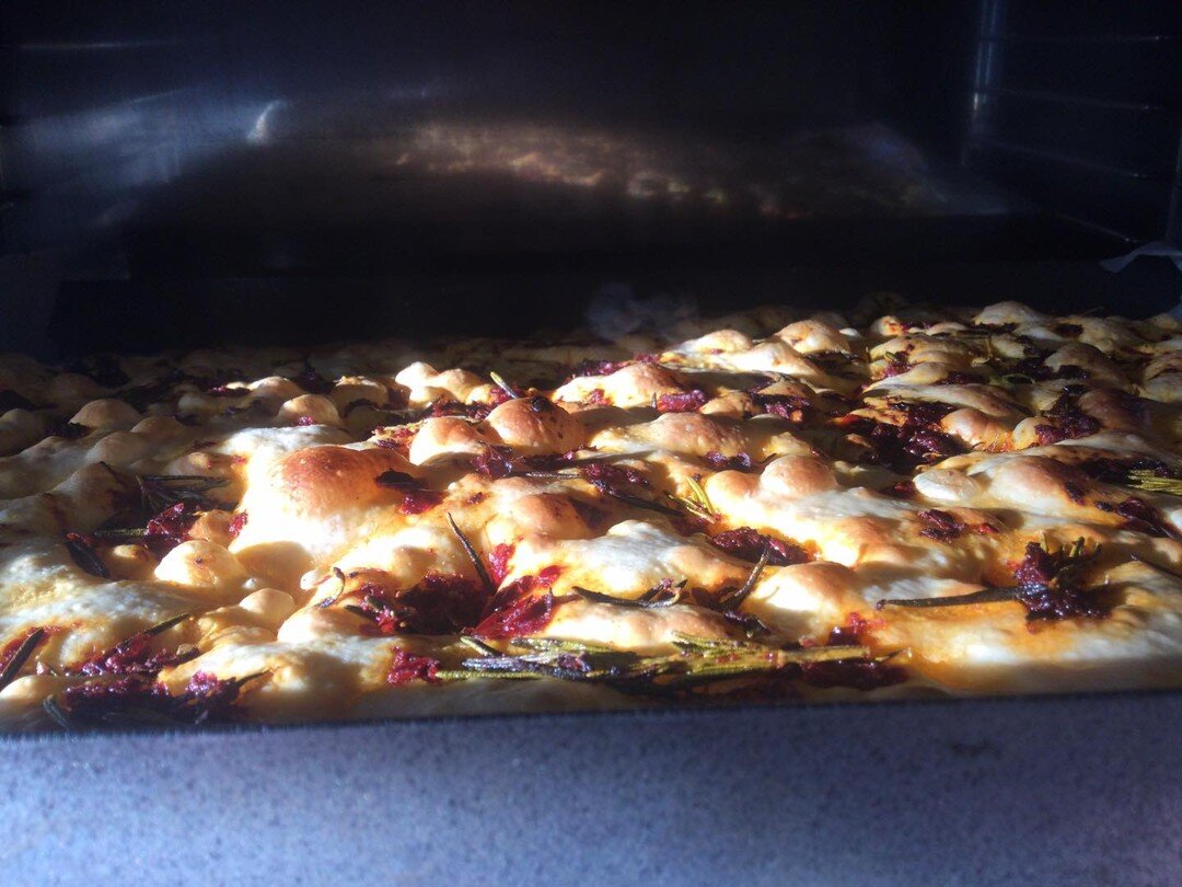 Rosemary and Harissa Focaccia bubbling in the oven 🤘