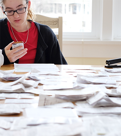 receipts all over a table disorganized