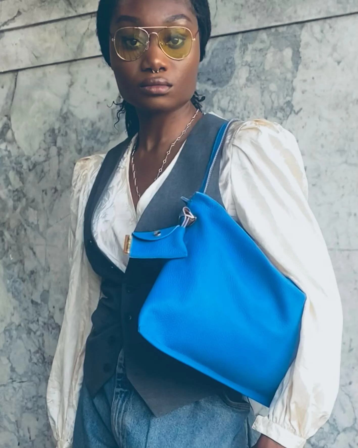 A note of punctuation:
The #gilli in &ldquo;cunningham&rdquo; blue completes a special sartorial statement.

Shop this style and our full range at www.LANCEPIERRES.com

#lancepierres #accessories #madeinla