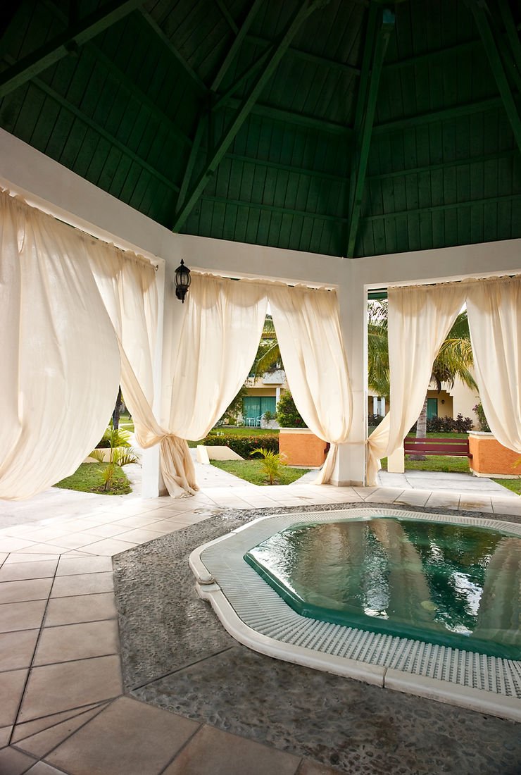 Should You Put Your Outdoor Hot Tub Under A Roof? | Spa Spot — Spa Spot