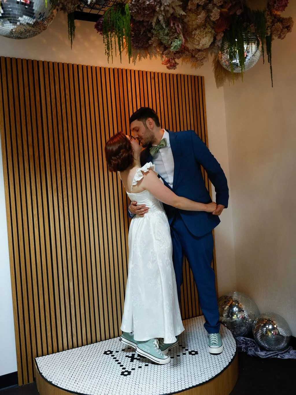 L+K&rsquo;s wedding was such a gorgeous expression of community. Lindsay&rsquo;s dad officiated, their friend baked the cake and another took photos, and the whole crew surprised them with matching Chucks. And of course, their VIP Weasley was in atte