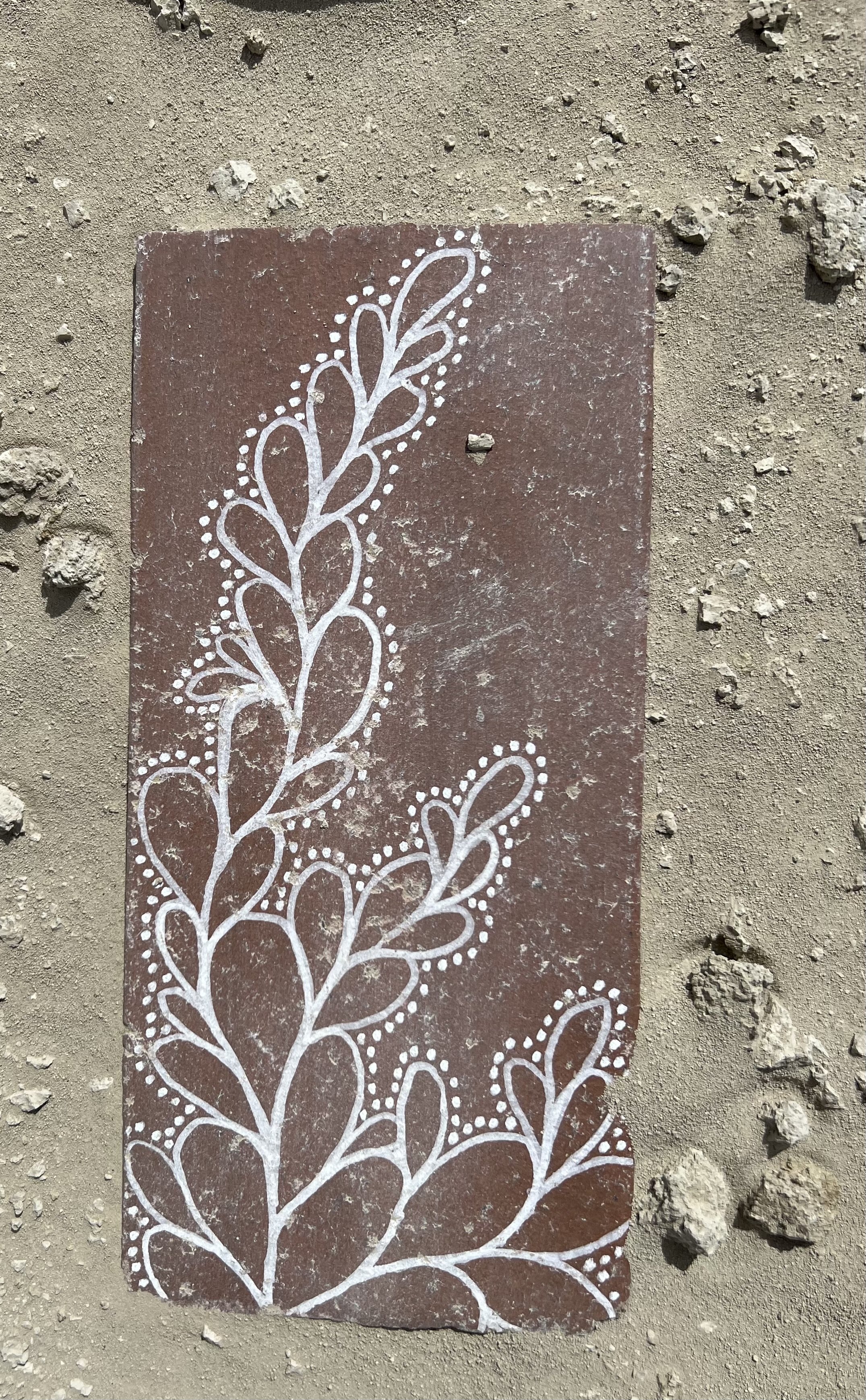 Tile set in playa dust.