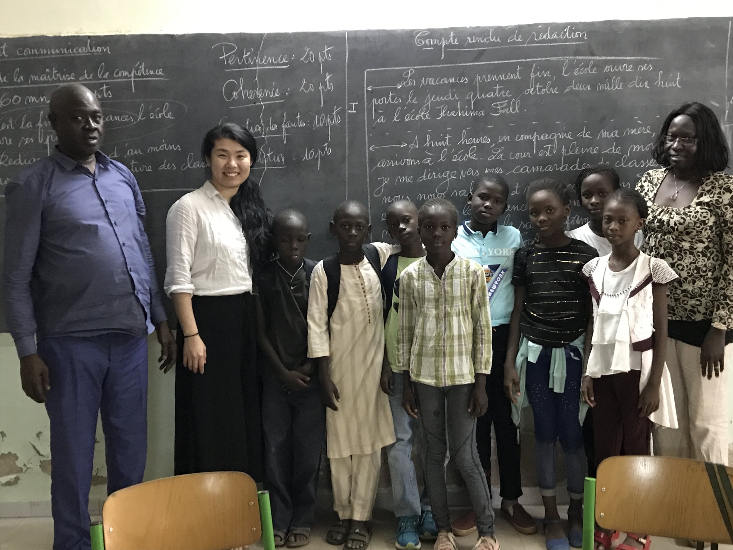 Mbacke Erina focus group kids and principal.jpg
