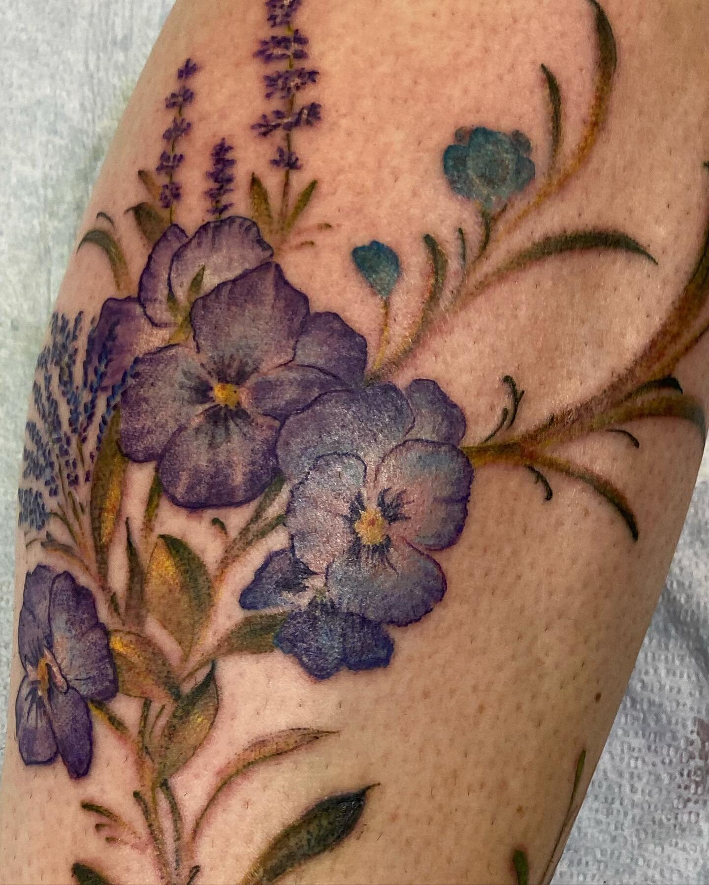 I do a ton of flowers. Both black and grey and full color. These were free handed on a few years back. It was such a fun piece for me to create. Can you name these flowers? They’re quite common, but I’ve been surprised how many people do