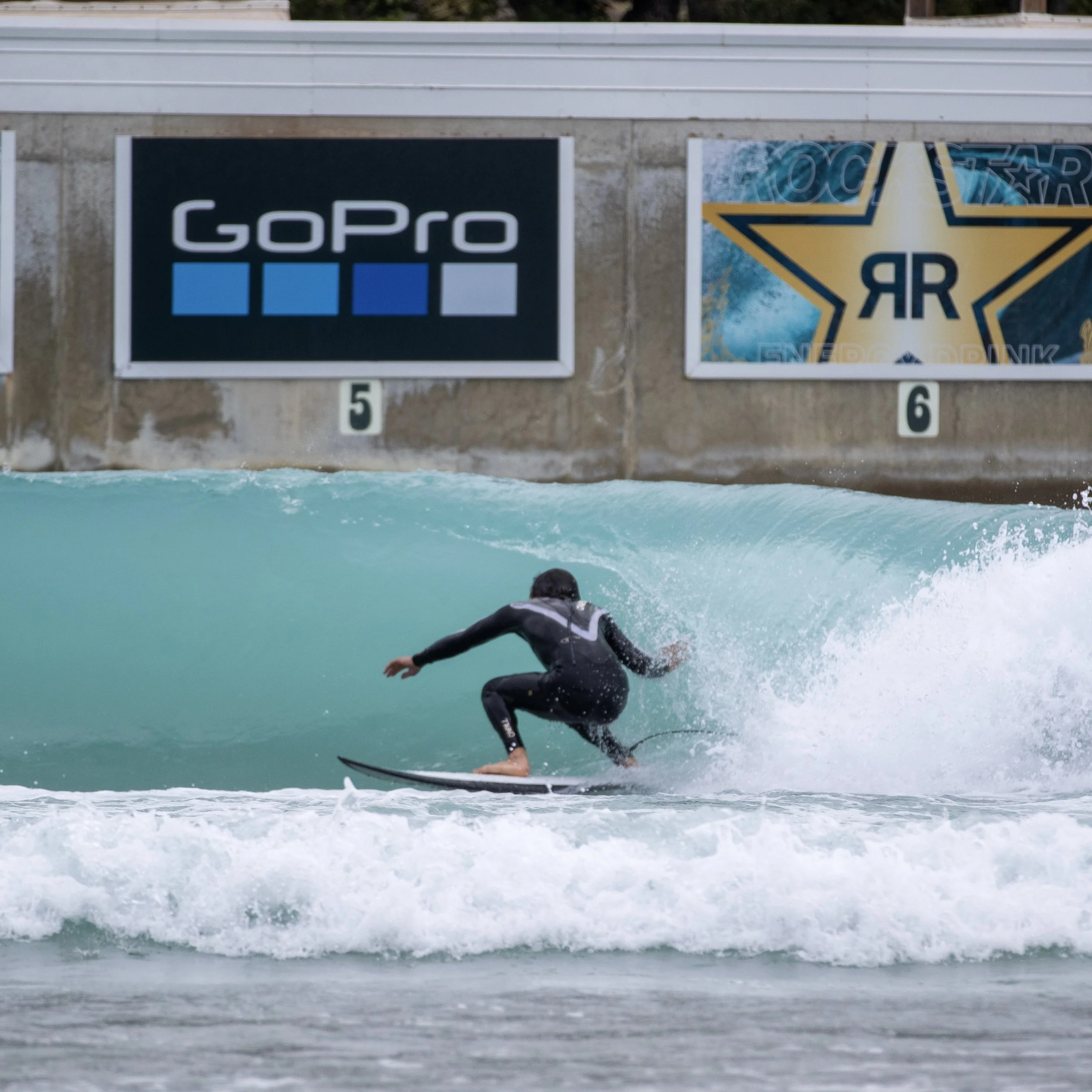 man surfing at waco surf ranch