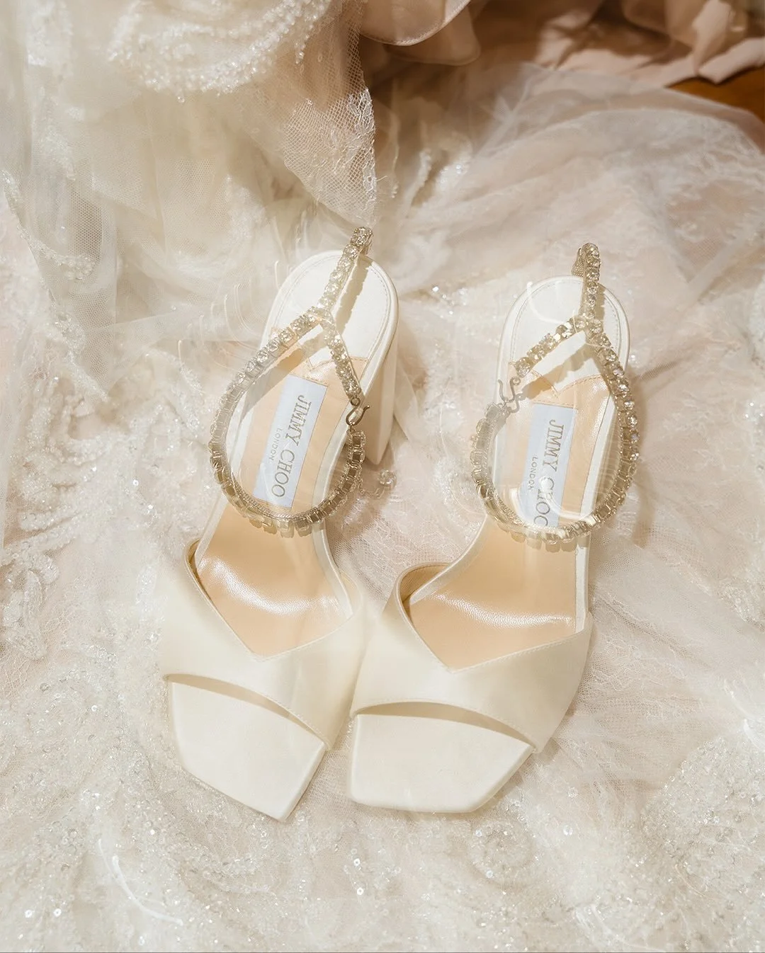 taking a minute for Elle&rsquo;s bridal prep 🦢🏹

(&amp; of course the Jimmy Choo&rsquo;s of dreams) 

Location @cornhillcastle 
Photography @forloveandthistle 
Celebrant @alanbarrhumanist 
Videographer @mediaimagesvideo 
Dress @bijoux_bridal 
Shoes