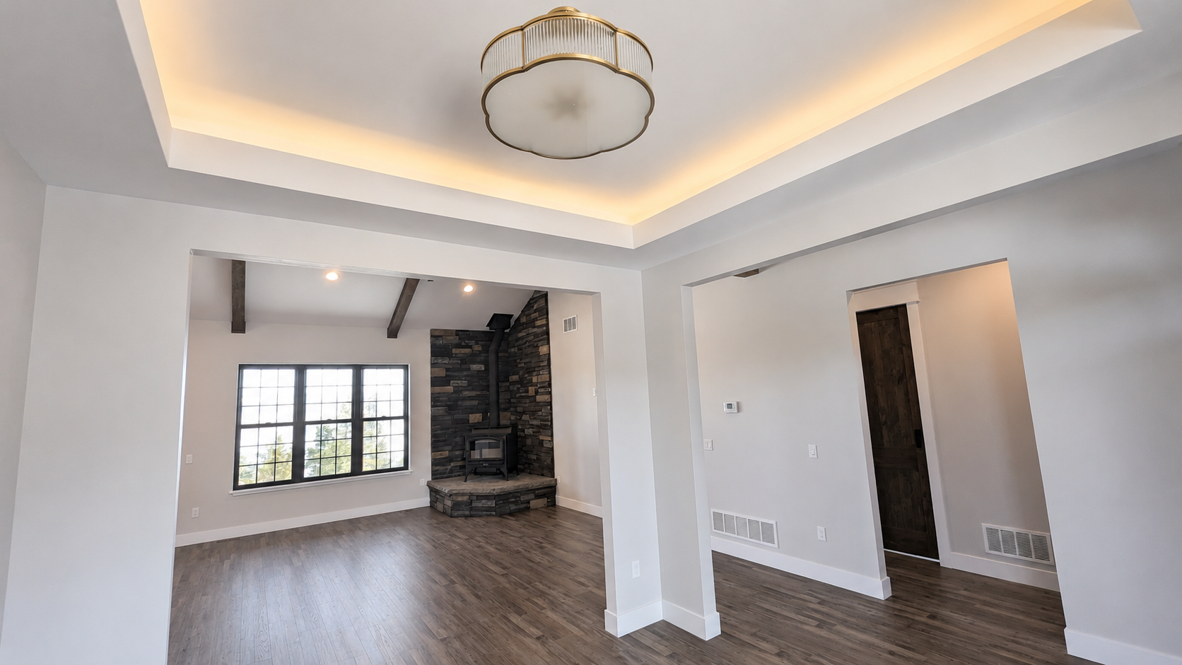 Cotton Construction Helena MT Custom Home Wood Floor Beams Fireplace