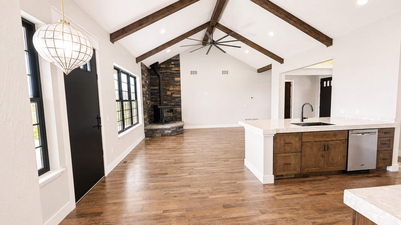 Cotton Construction Helena MT Custom Home Wood Floor Beams Fireplace