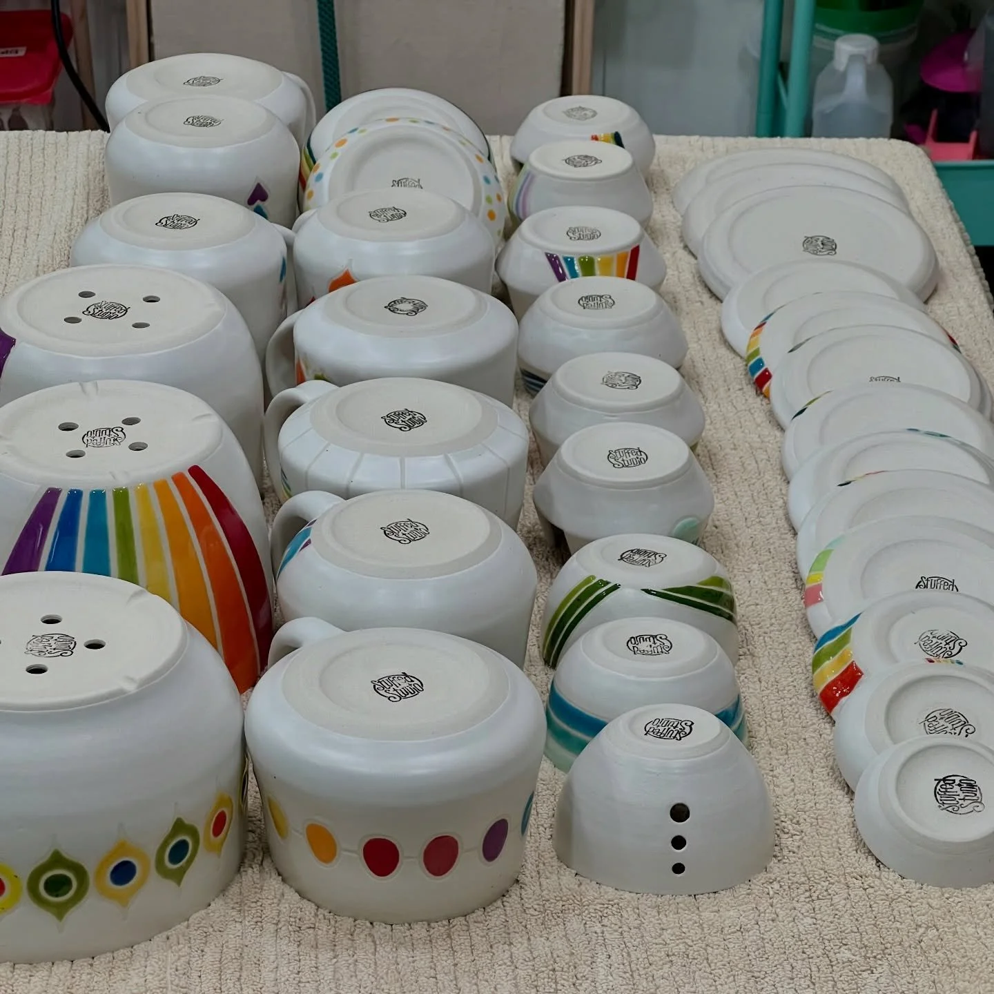 Bottoms sanded. All washed. One more step, then pricing &amp; inventory. 🌈💖

These, and many more pieces will be at Saturday&rsquo;s @makinglocalmarkets in downtown Bothell, WA. 

#smallbatchpottery #pottery #rainbow #stuffedstudio