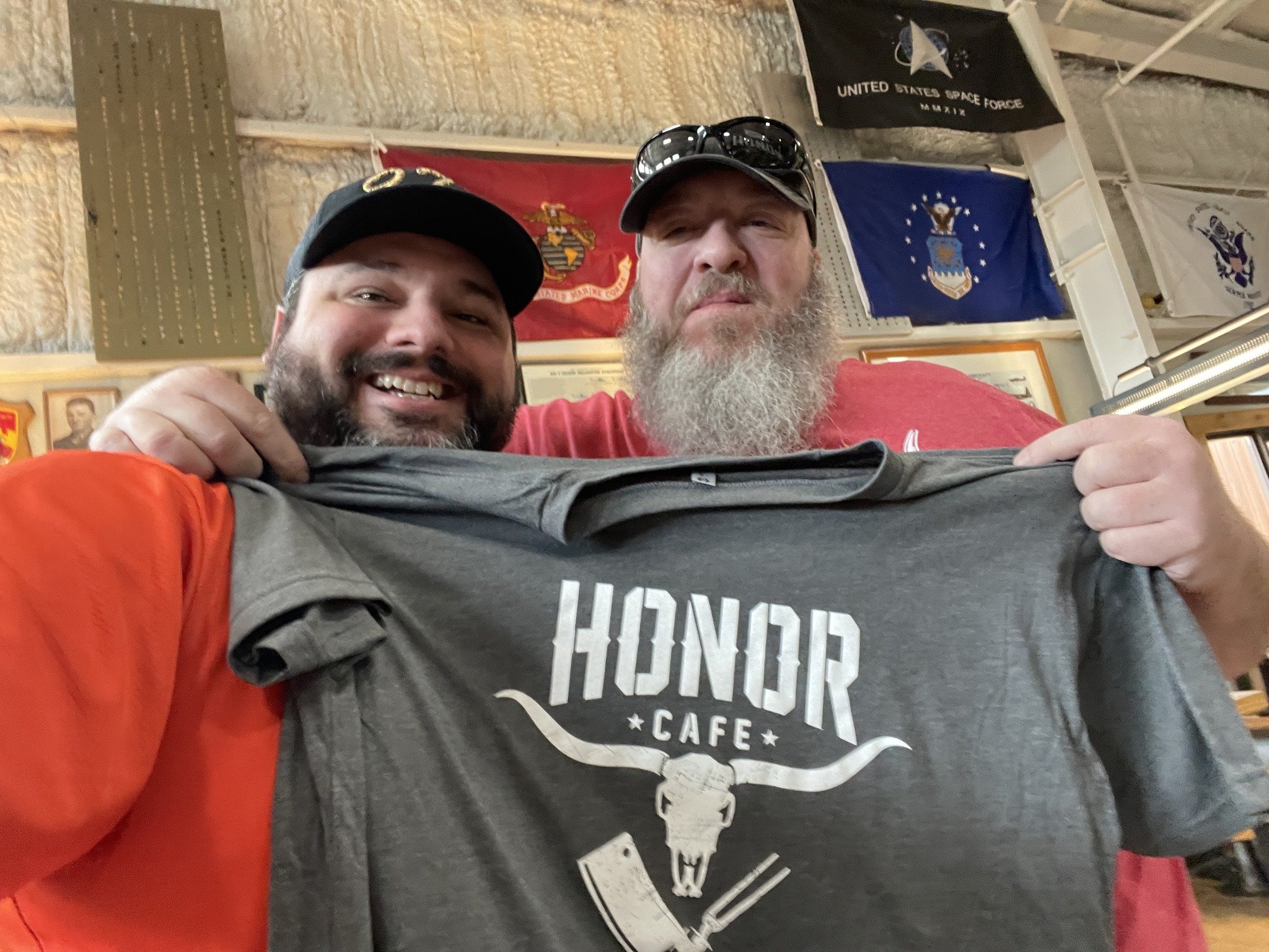 Recently, a dream of ours came true and we got to make some shirts for @honorcafeconroe. I got to make this design for Chris, the owner, and since Chris is a @marines  Veteran I made the handles of the cleaver and carving fork the same as the handle 