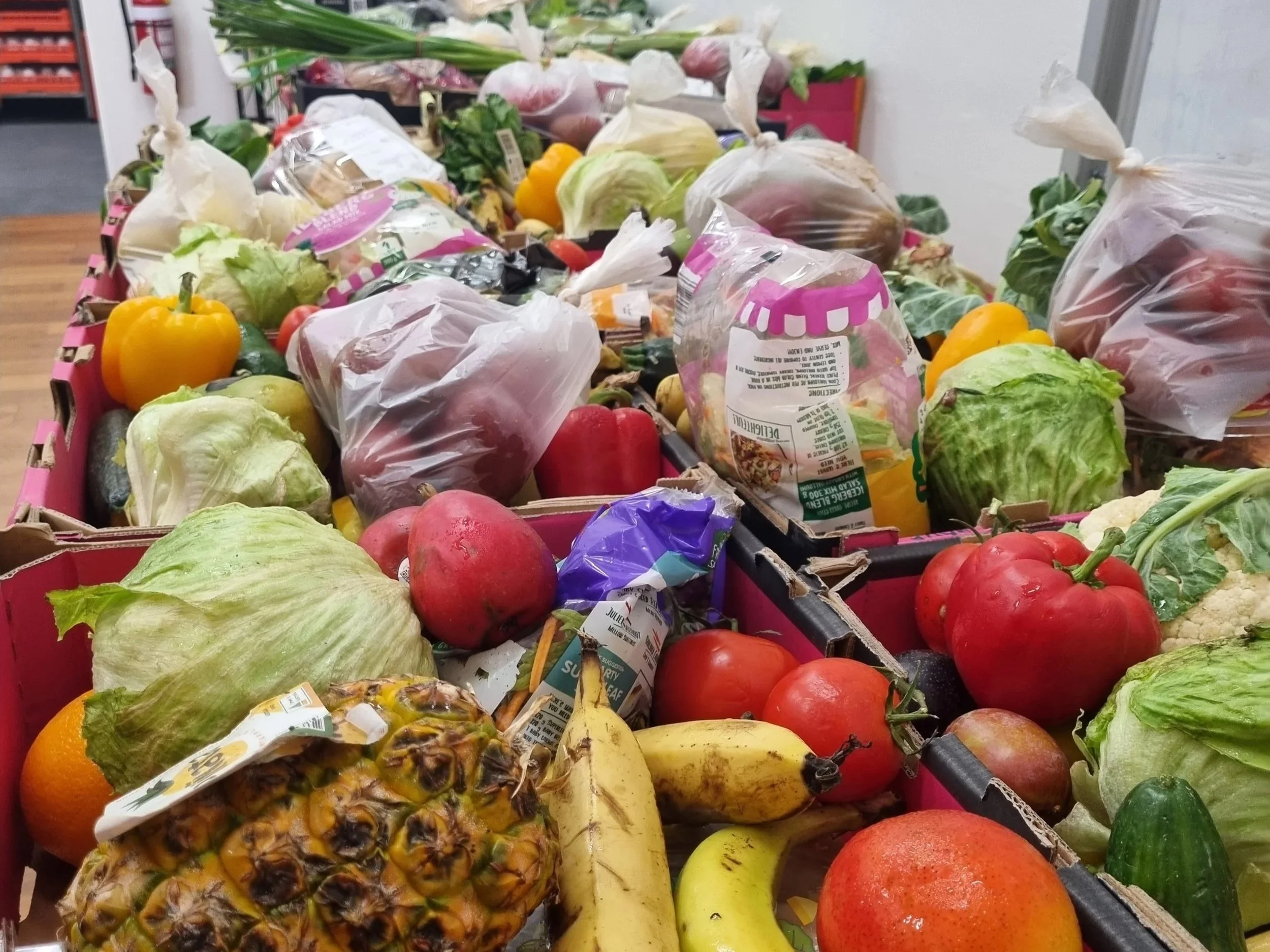 Crates of rescued fruit and vegetables ready to be shared