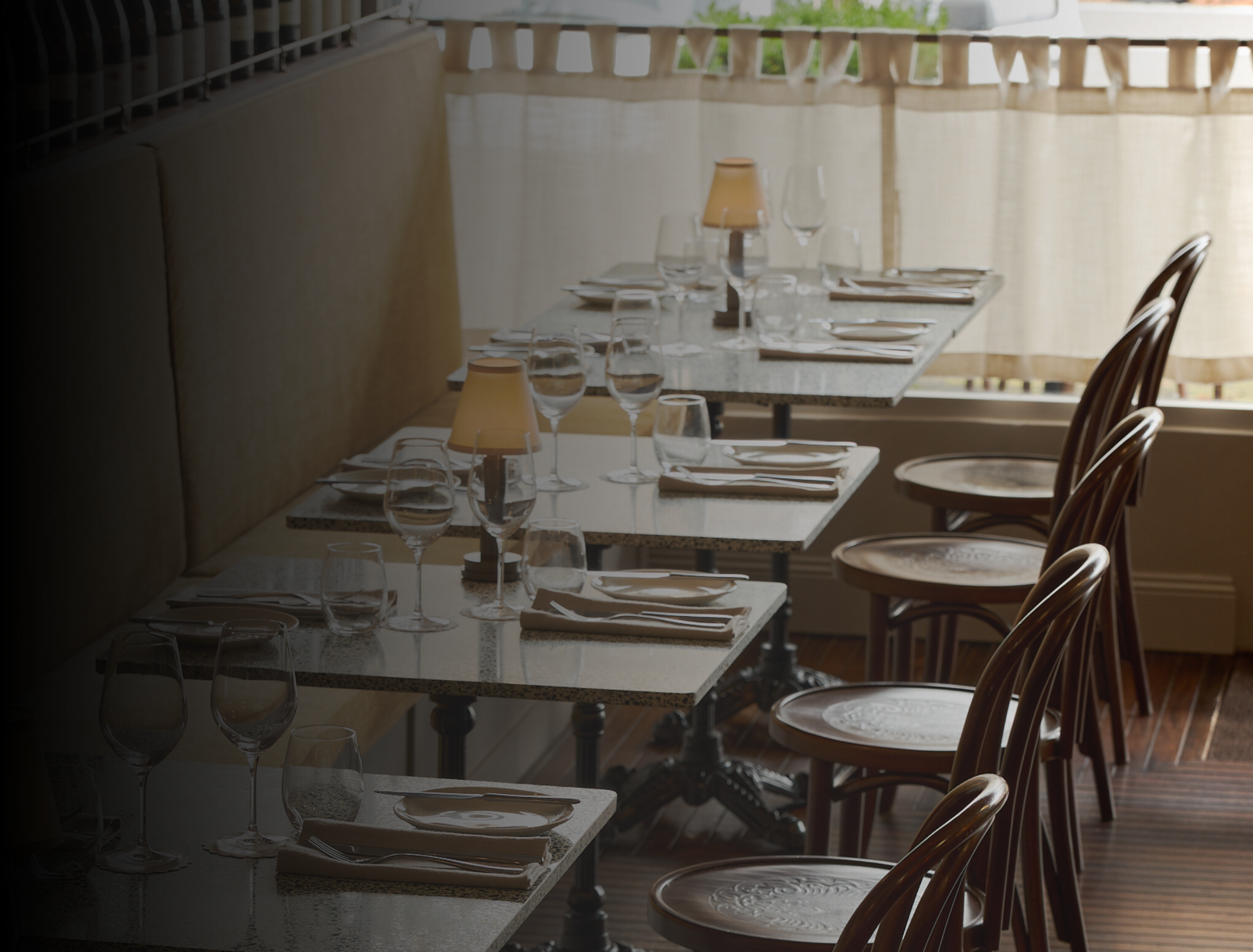 Elegantly set dining room at Chez Bagou French restaurant in Albert Park, Melbourne