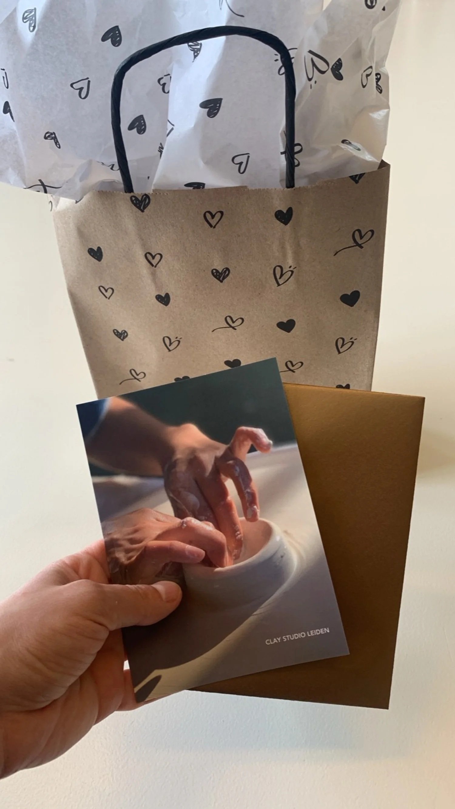 Clay Studio Leiden gift voucher and gift bag