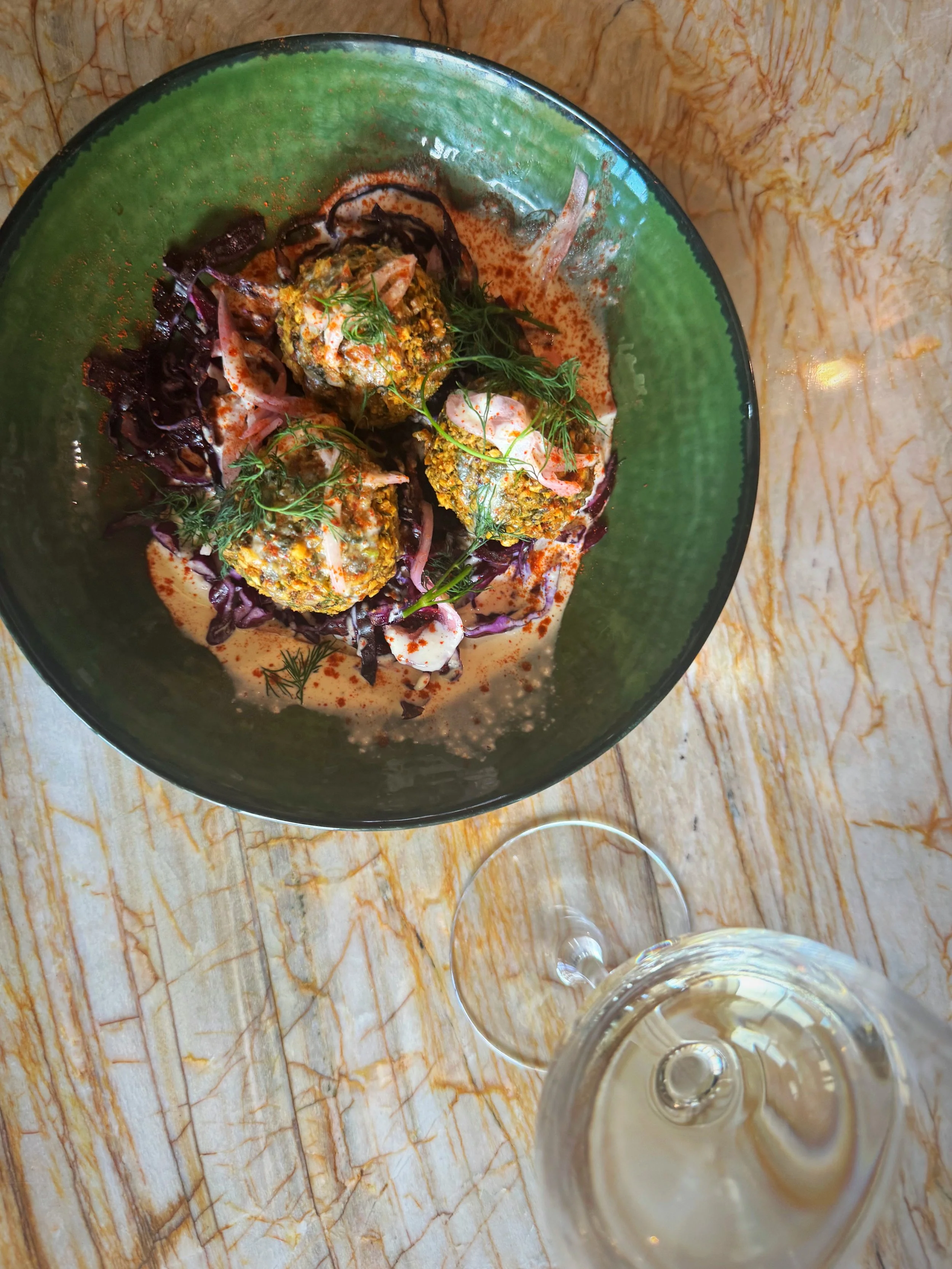 Housemade Falafel with Tahini, Garlic Toum & Shaved Cabbage