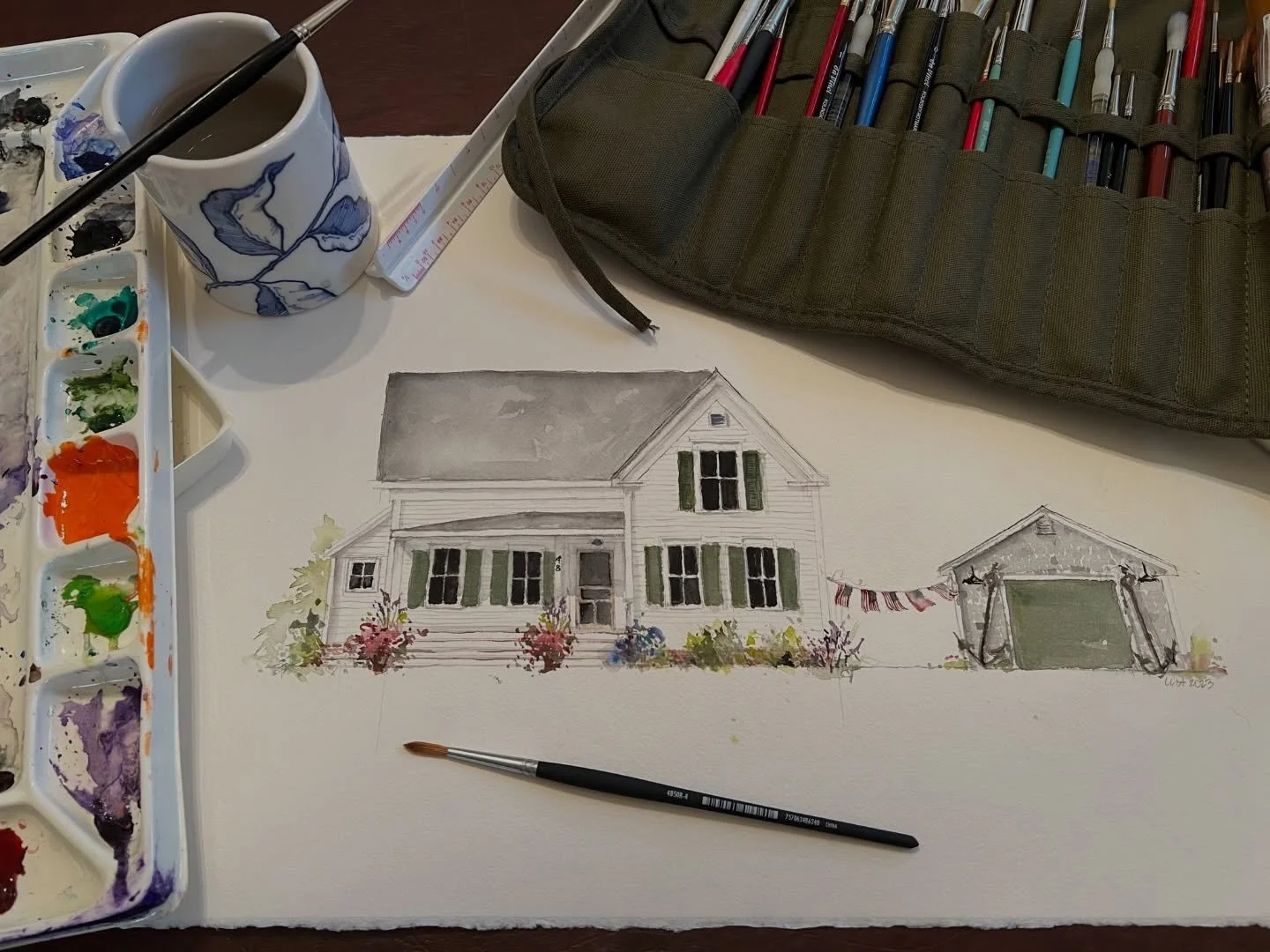 In my happy place with my sketches and a little watercolor 💕