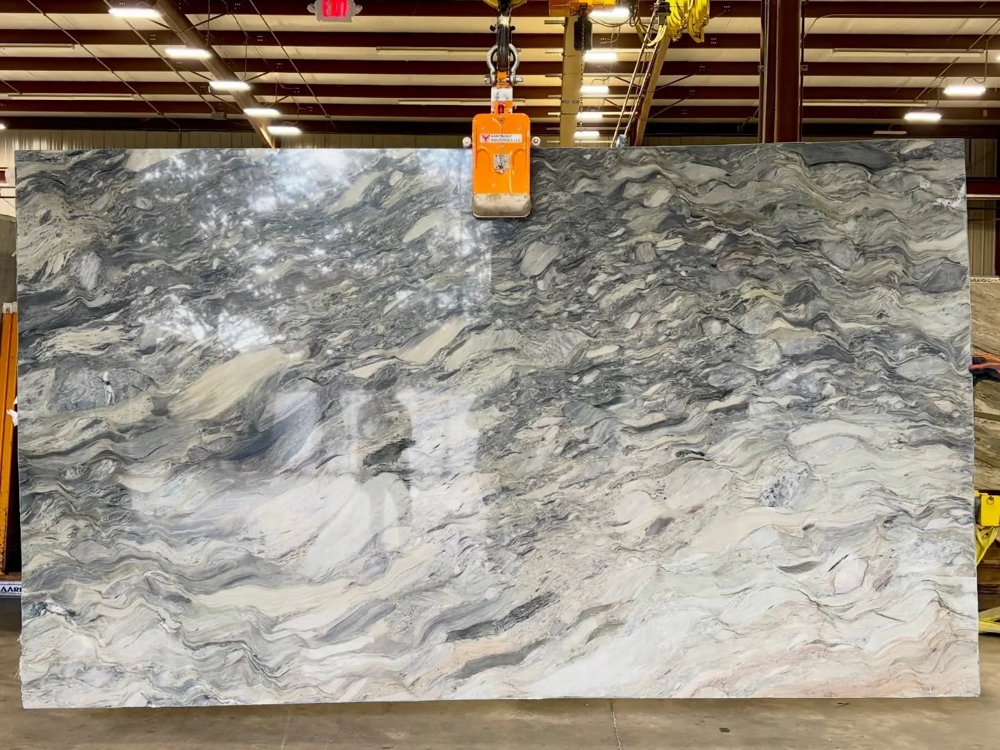 When we talk about choosing materials for a home&rsquo;s sense of place - this is exactly what we mean.

Don&rsquo;t let the photos fool you; in person, this bold slab is rich with dark greens, warm browns, and smoky blues that tie in the entire home
