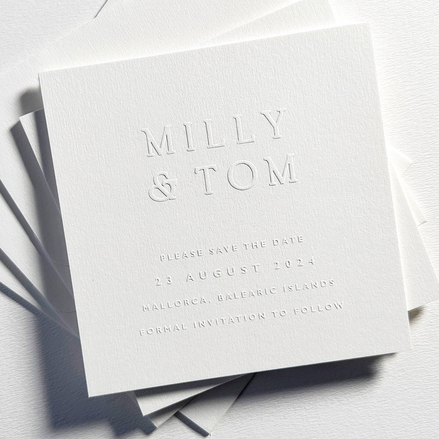 Blind embossed save the dates and and an all white suite for Milly and Tom ☁️