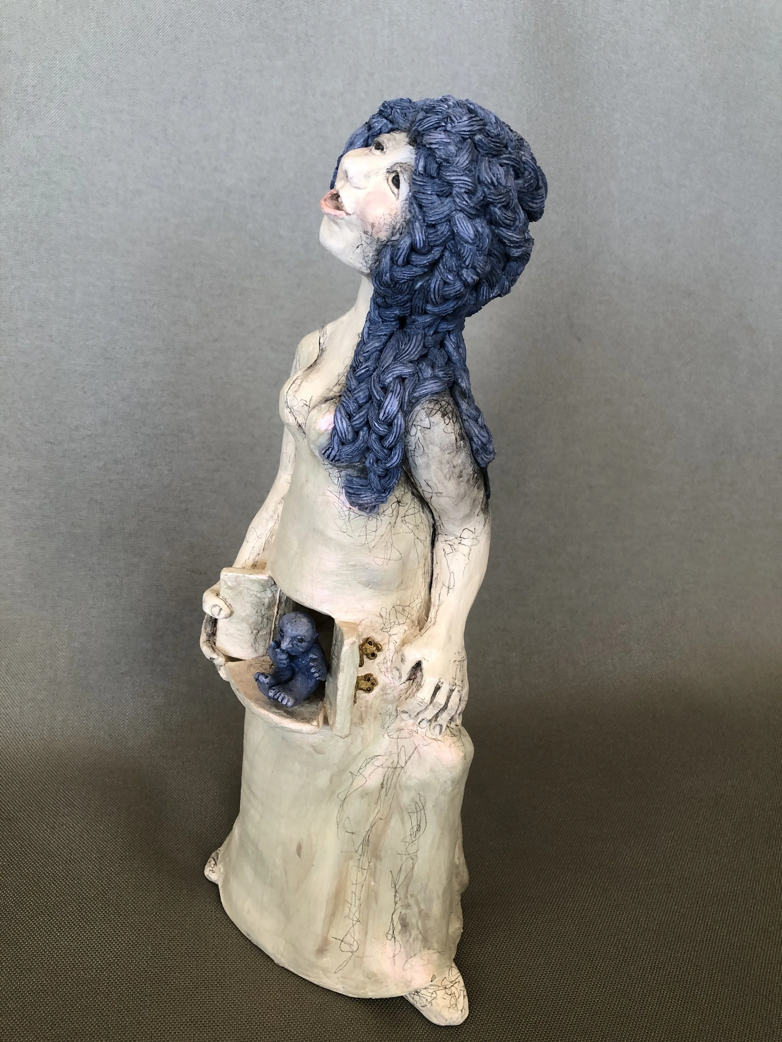 Susan Press_The Little Blue Man_, '24,porcelain, $1200..jpeg