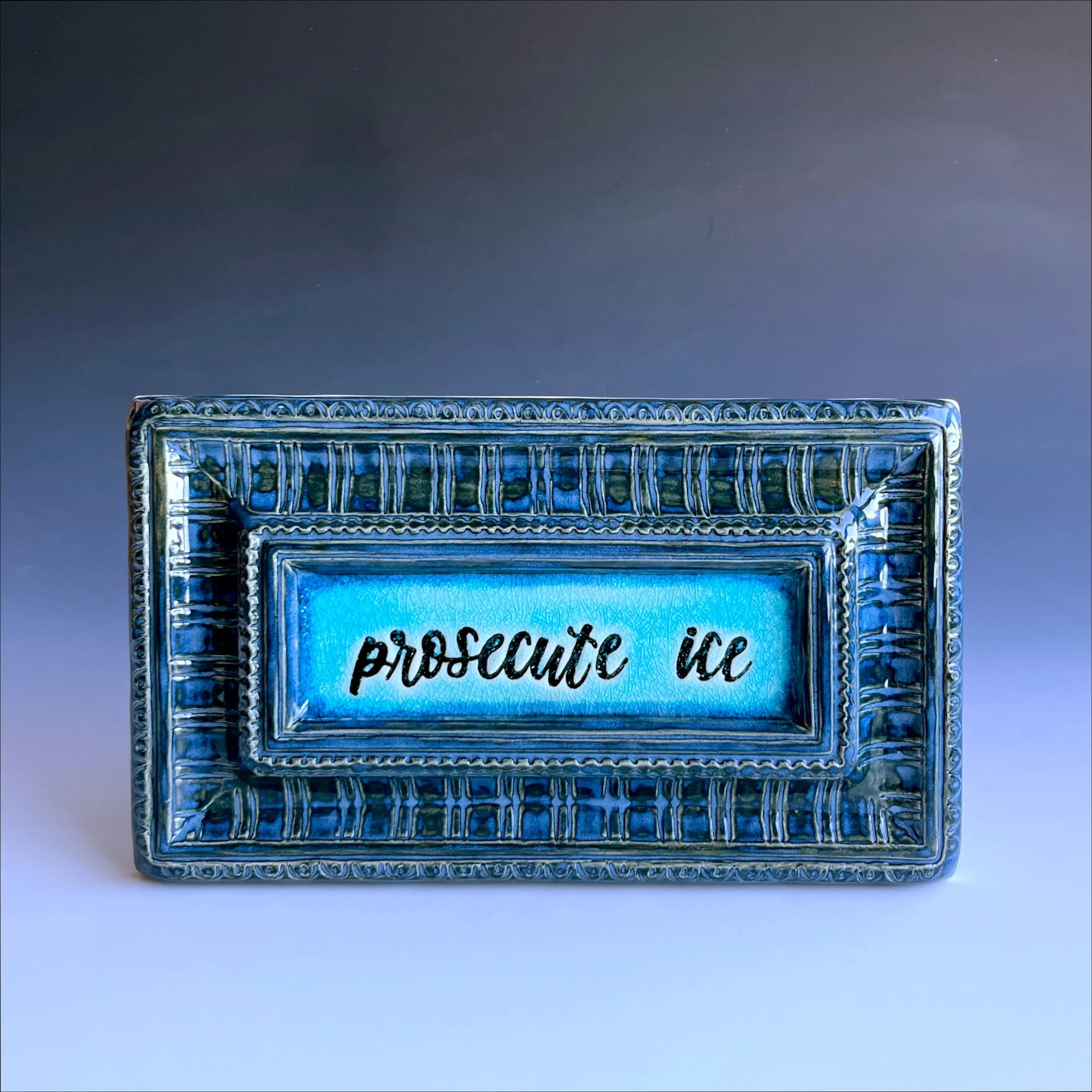 Melisa_MWYPottery_2026_Prosecute_ICE_stoneware_glaze_$250_10.75x6.25x1.5in.JPEG